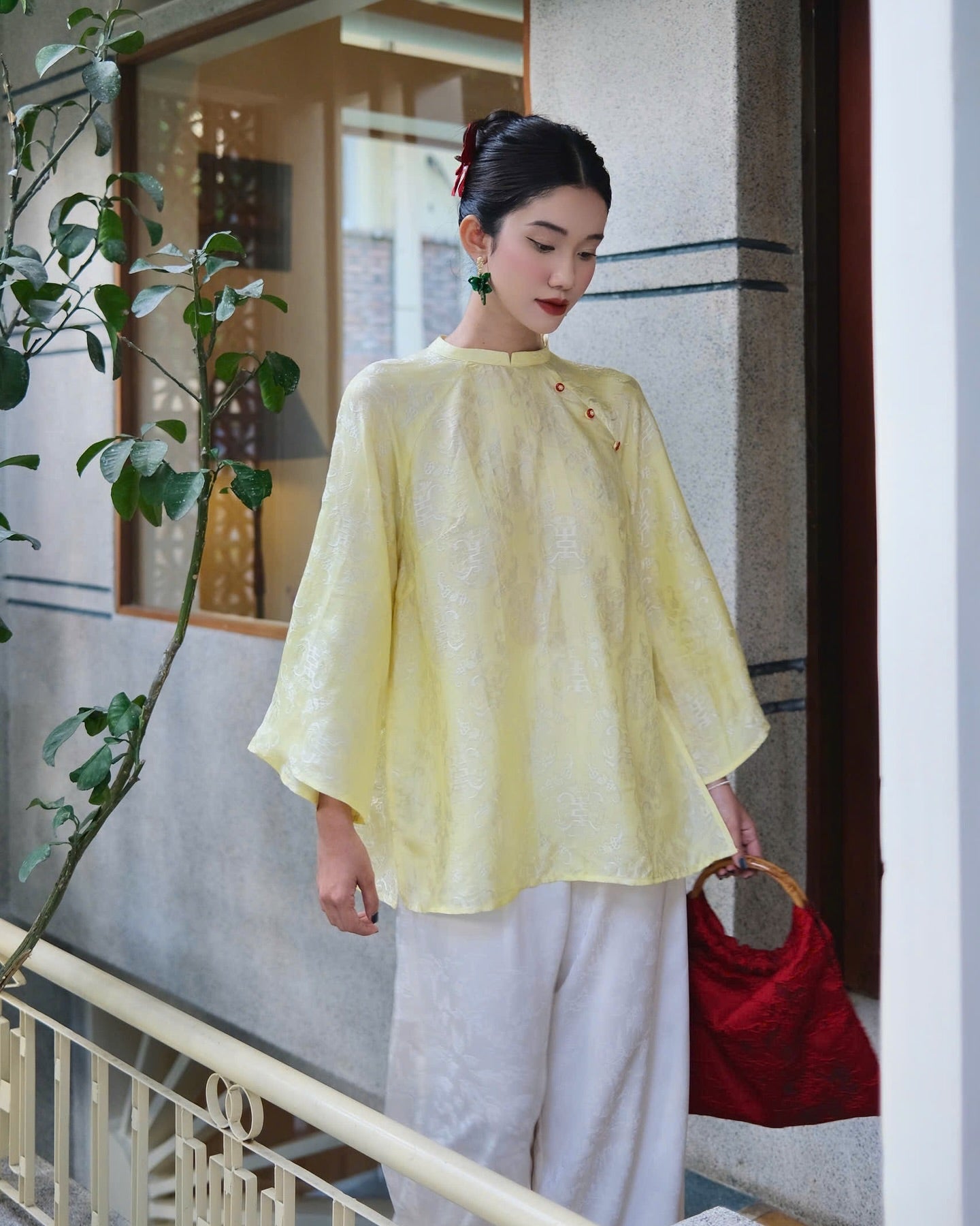 "Minh Hy wide-leg jacquard silk pants in white, traditional Vietnamese design by Hy Phuong"