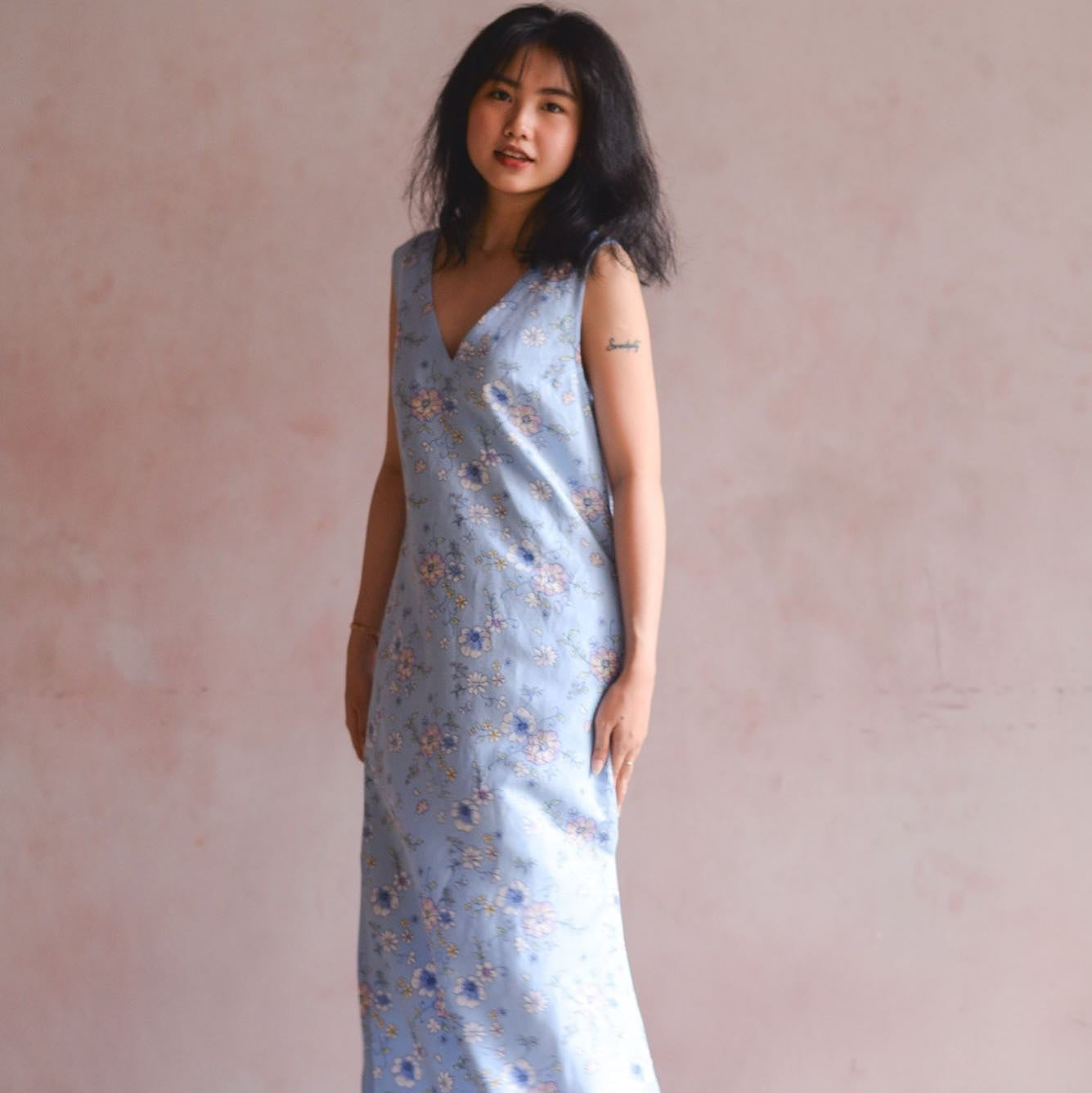 "Everyday Flower" linen maxi dress in blue with floral pattern, sleeveless design by Turmeric.