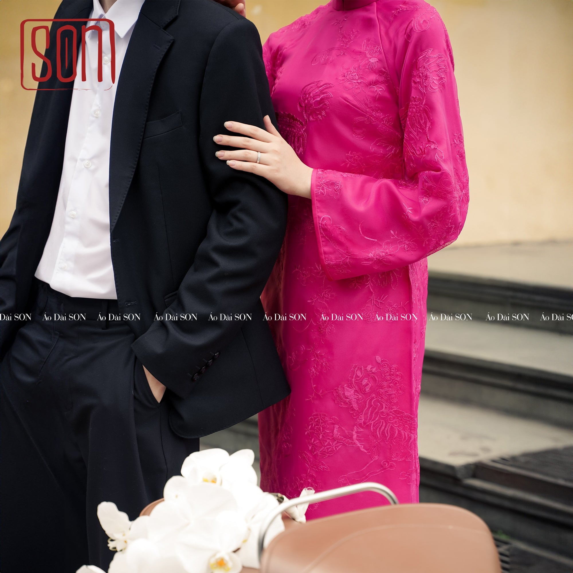 "Yen Son" magenta embroidered Ao Dai set, traditional Vietnamese silk dress with floral jacquard pattern.