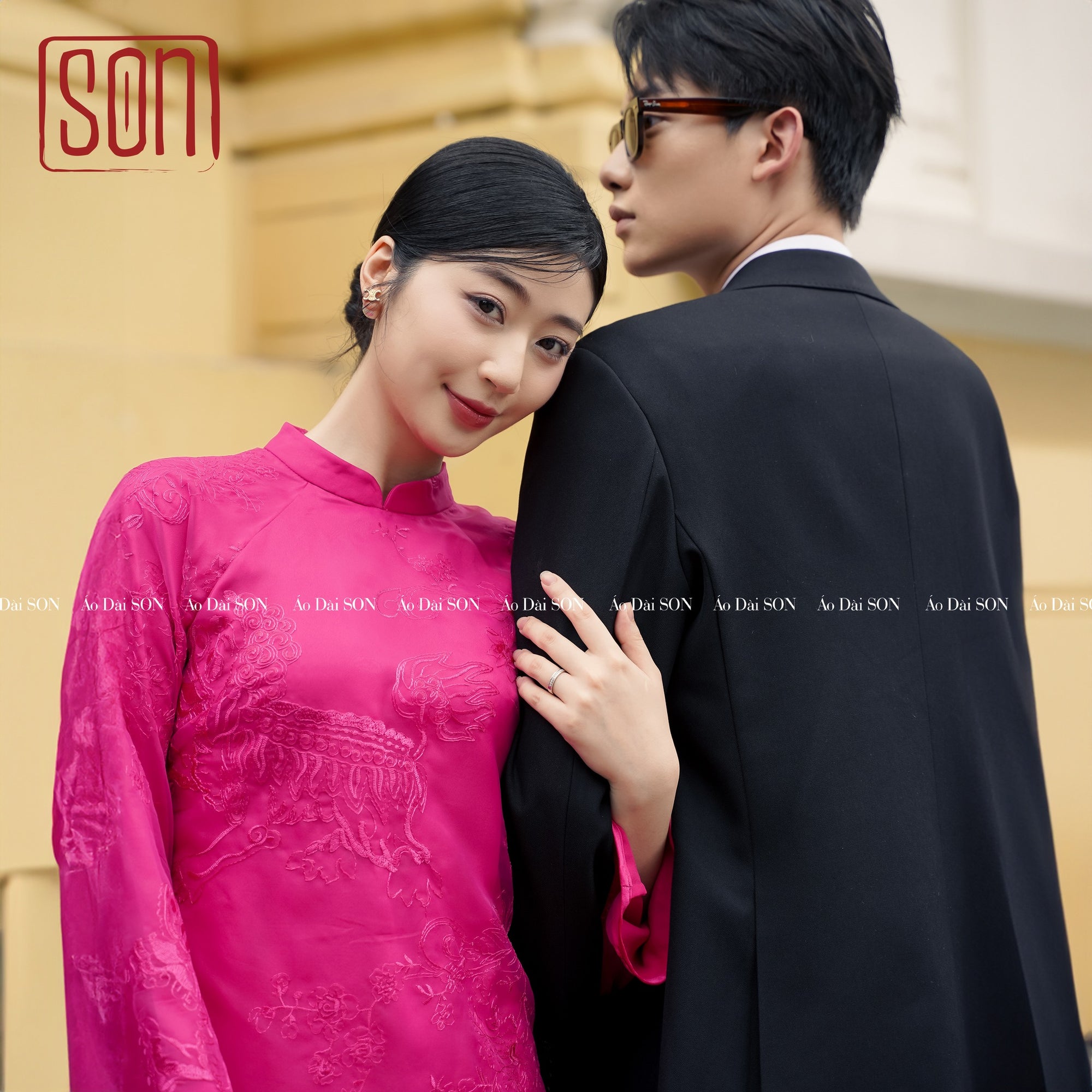 "Yen Son" magenta embroidered Ao Dai set, traditional Vietnamese silk dress with floral jacquard pattern.