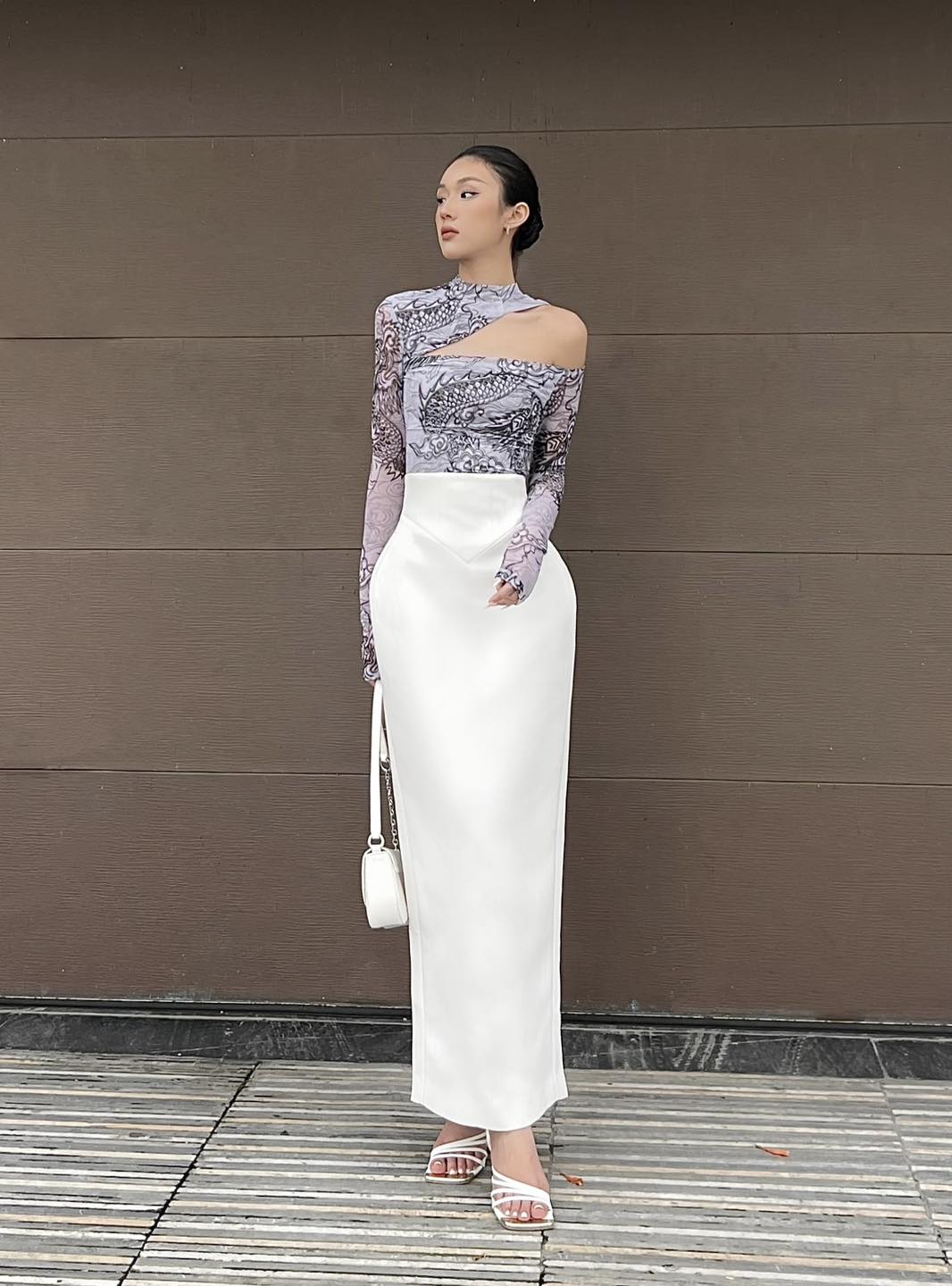 "Jia Chen Cut-out Tulle top in black by Keira Tong, featuring modern traditional patterns, cultural authenticity."