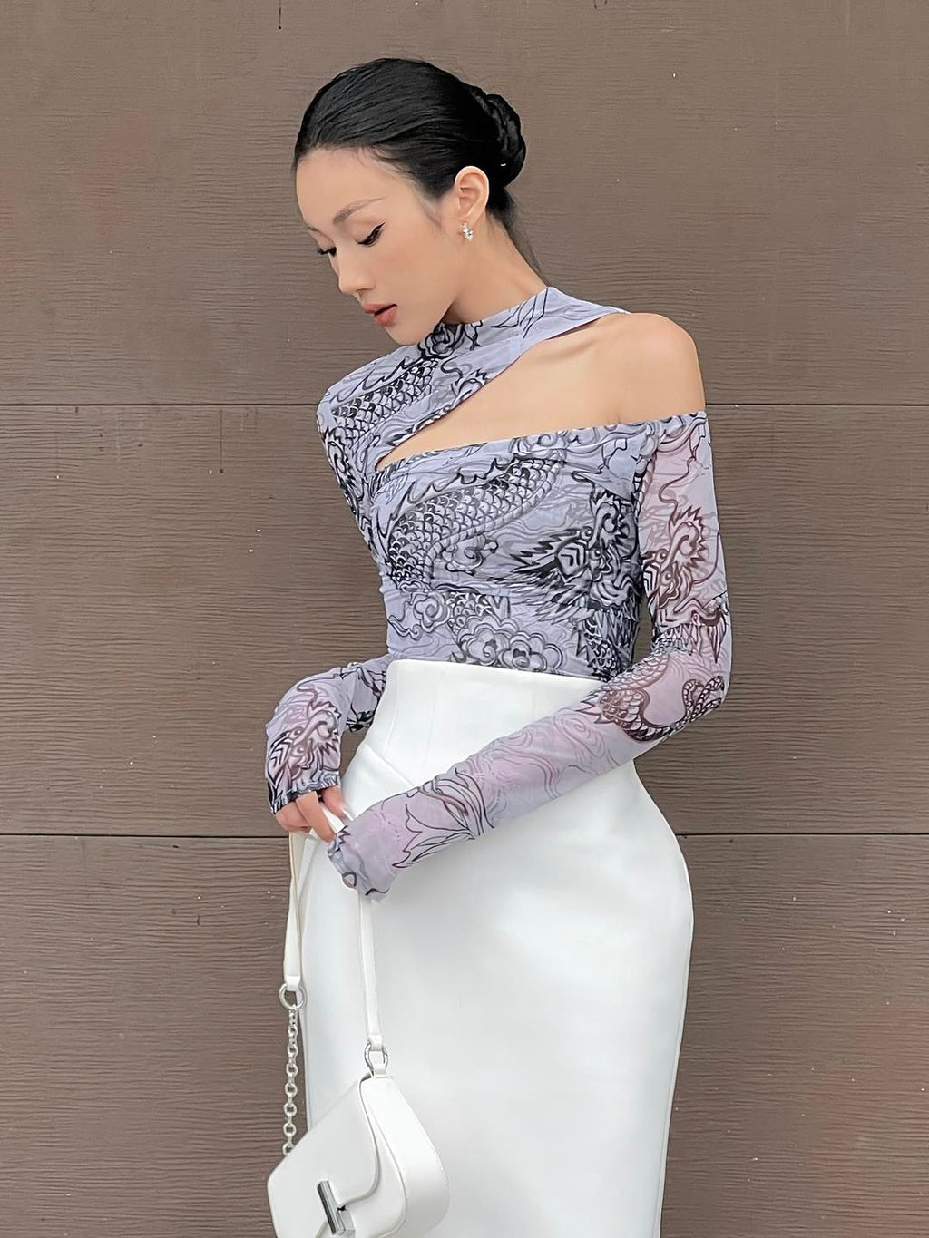 "Jia Chen Cut-out Tulle top in black with traditional patterns, modern design by Keira Tong."