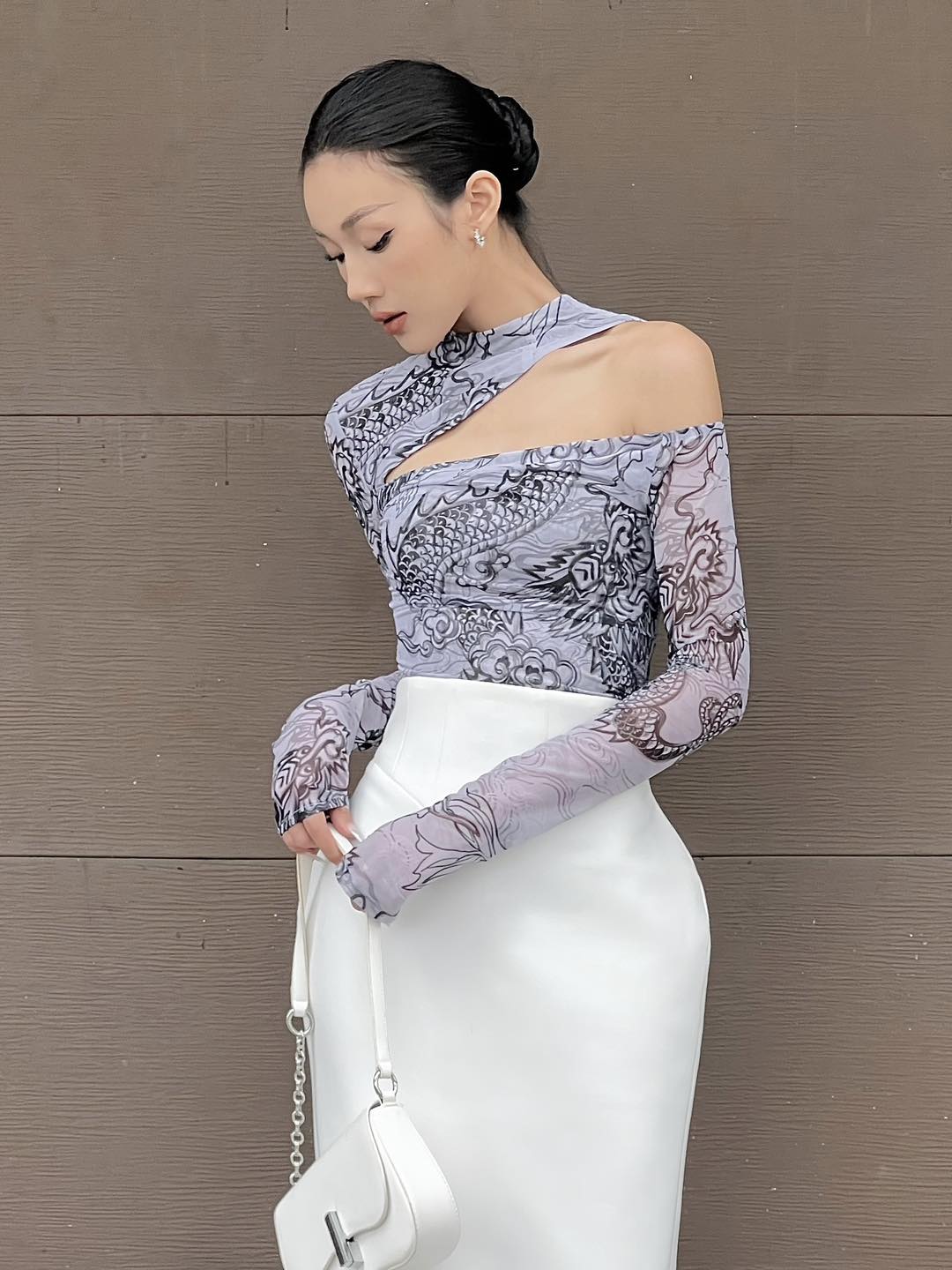 "Jia Chen Cut-out Tulle top in black with traditional patterns, modern design by Keira Tong."