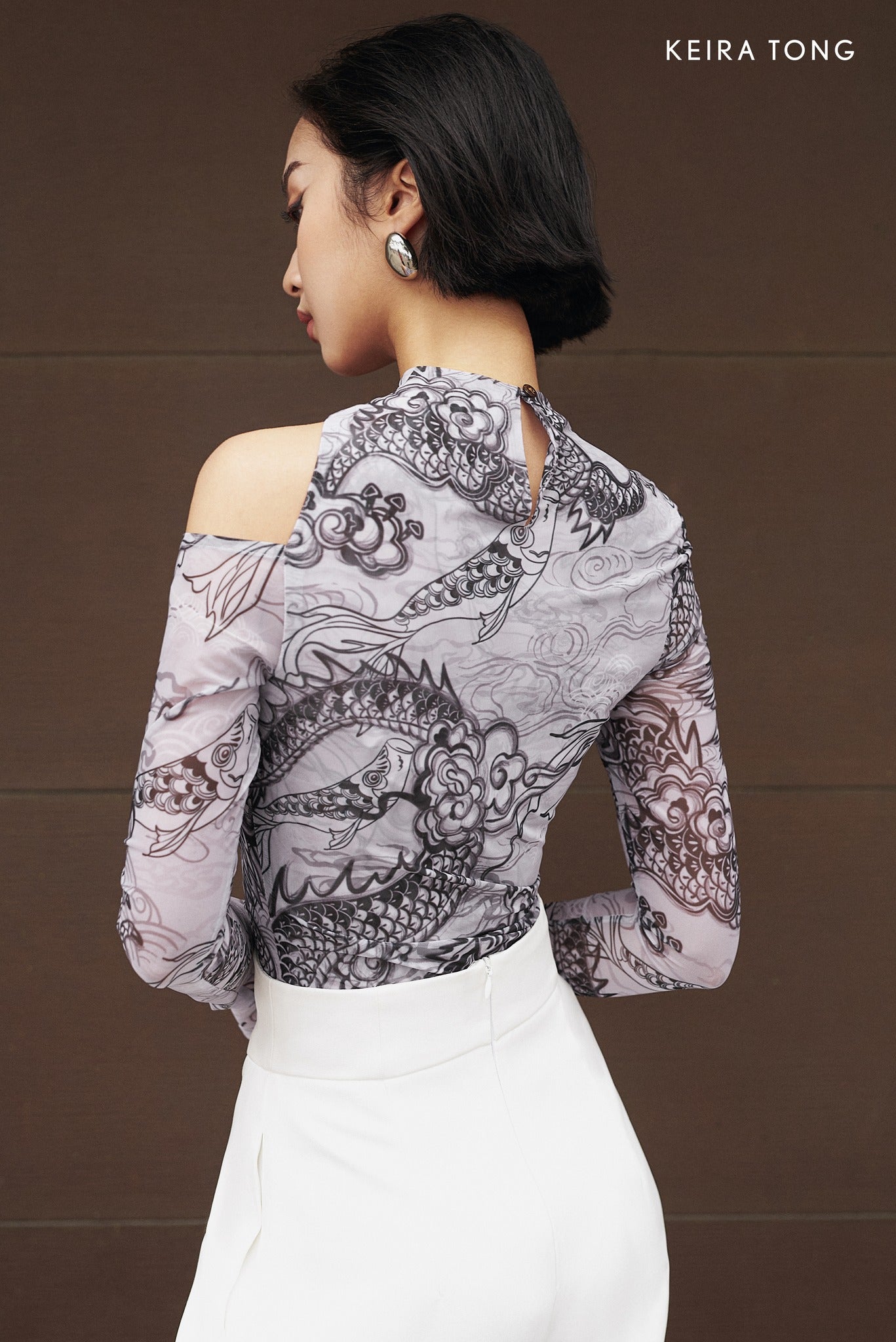 "Jia Chen Cut-out Tulle top in black with traditional dragon pattern by Keira Tong"