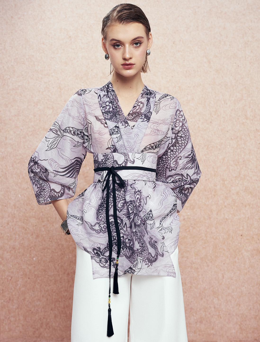 "Vĩ Kimono Top by Keira Tong in black silk organza, traditional and modern patterns, cultural elegance."