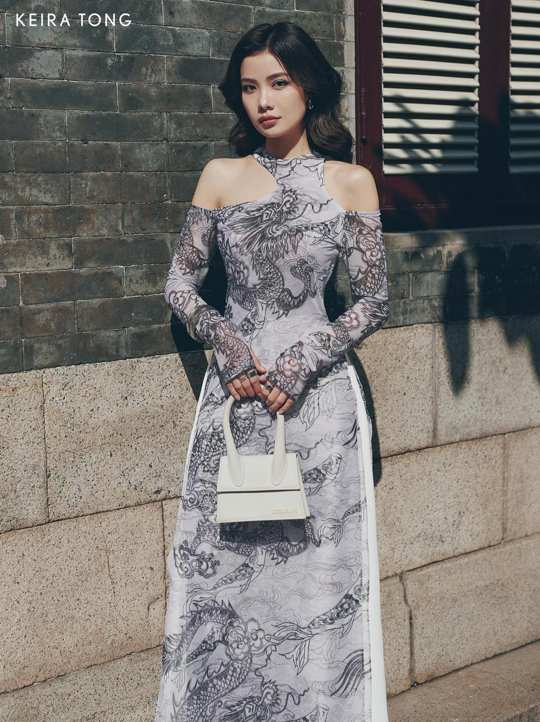 "Jia Chen - Black Tulle Ao Dai Set by Keira Tong, traditional Vietnamese dress with modern dragon pattern."