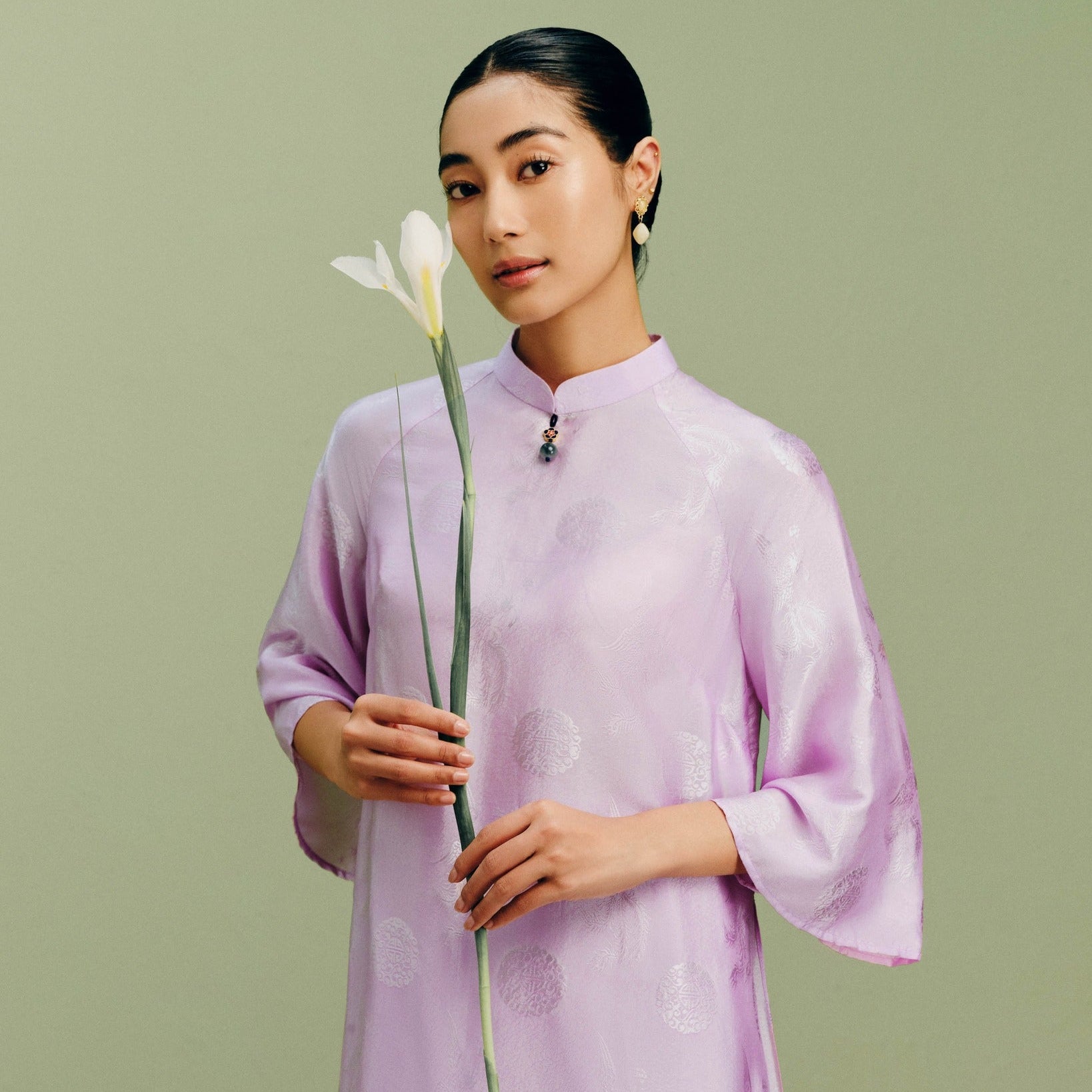 "Phung Cac Luxury Ao dai in light pink silk jacquard, traditional Vietnamese dress by Nam Phuong Y"