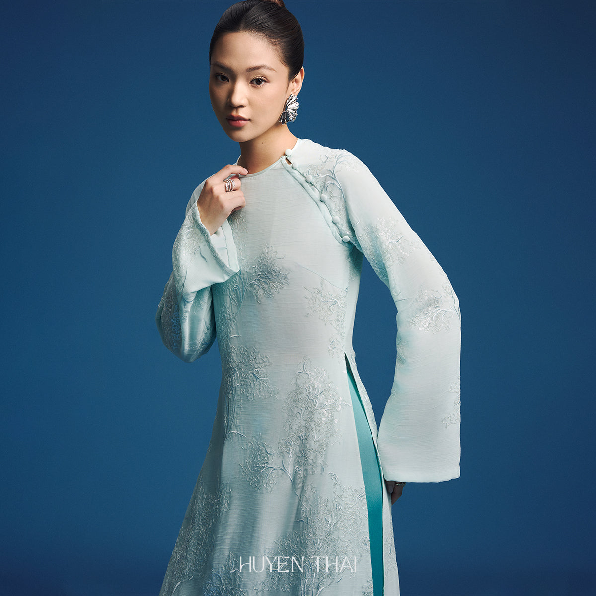Vietnamese Ao Dai - Uyen My - Modern Ao Dai Set - front view in silk in light blue by Huyen Collection
