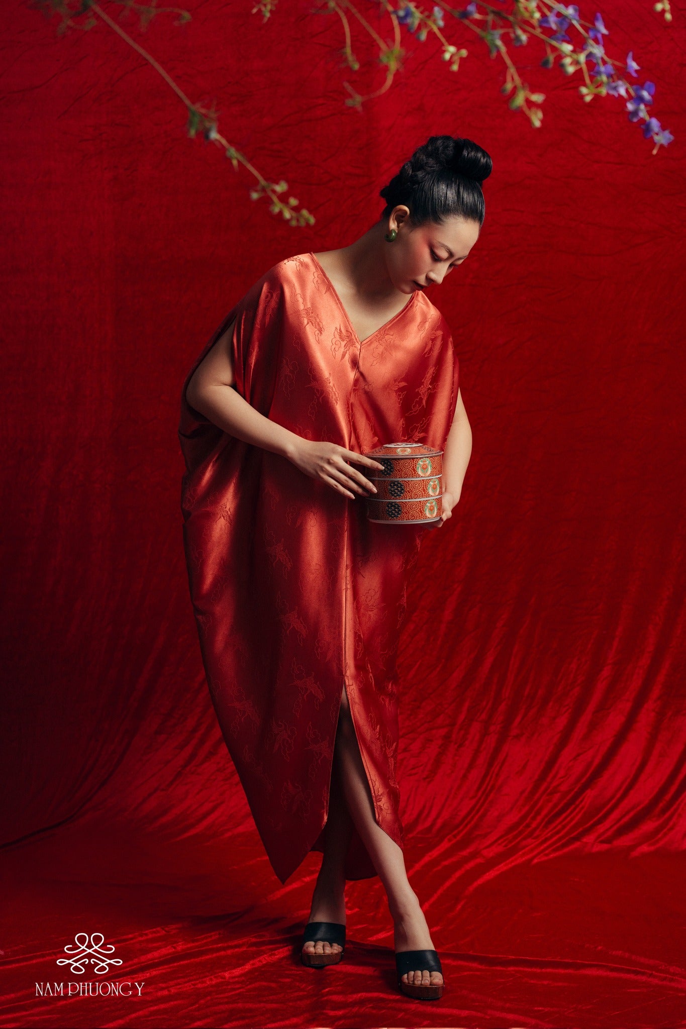 Vietnamese Ao Dai - Yen Van - Limited Edition Worksilk Dress in Blooming Orange - side profile in red by Nam Phuong Y