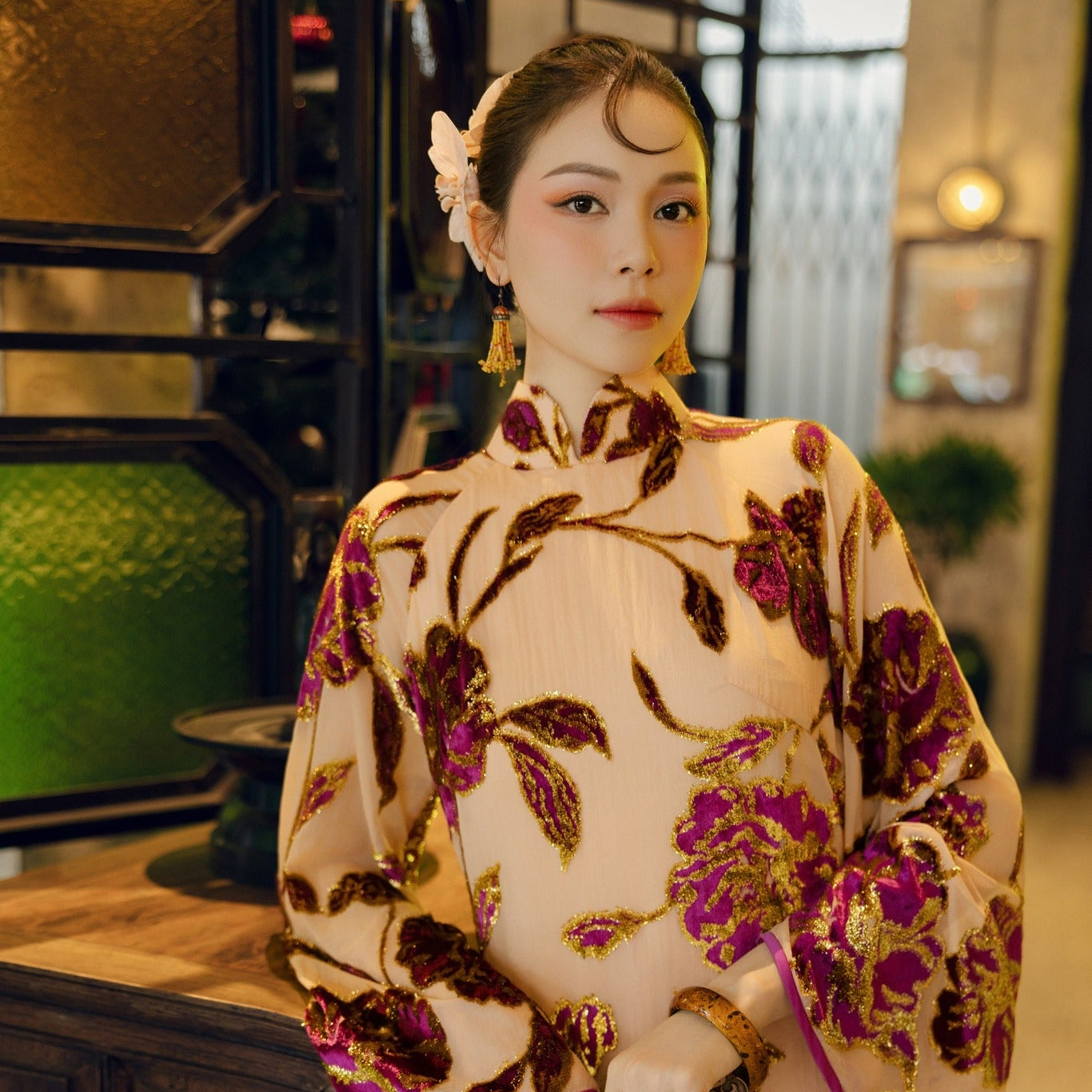 "Huỳnh Chi” Áo Dài Set in violet sequin satin, traditional Vietnamese dress with floral embroidery."