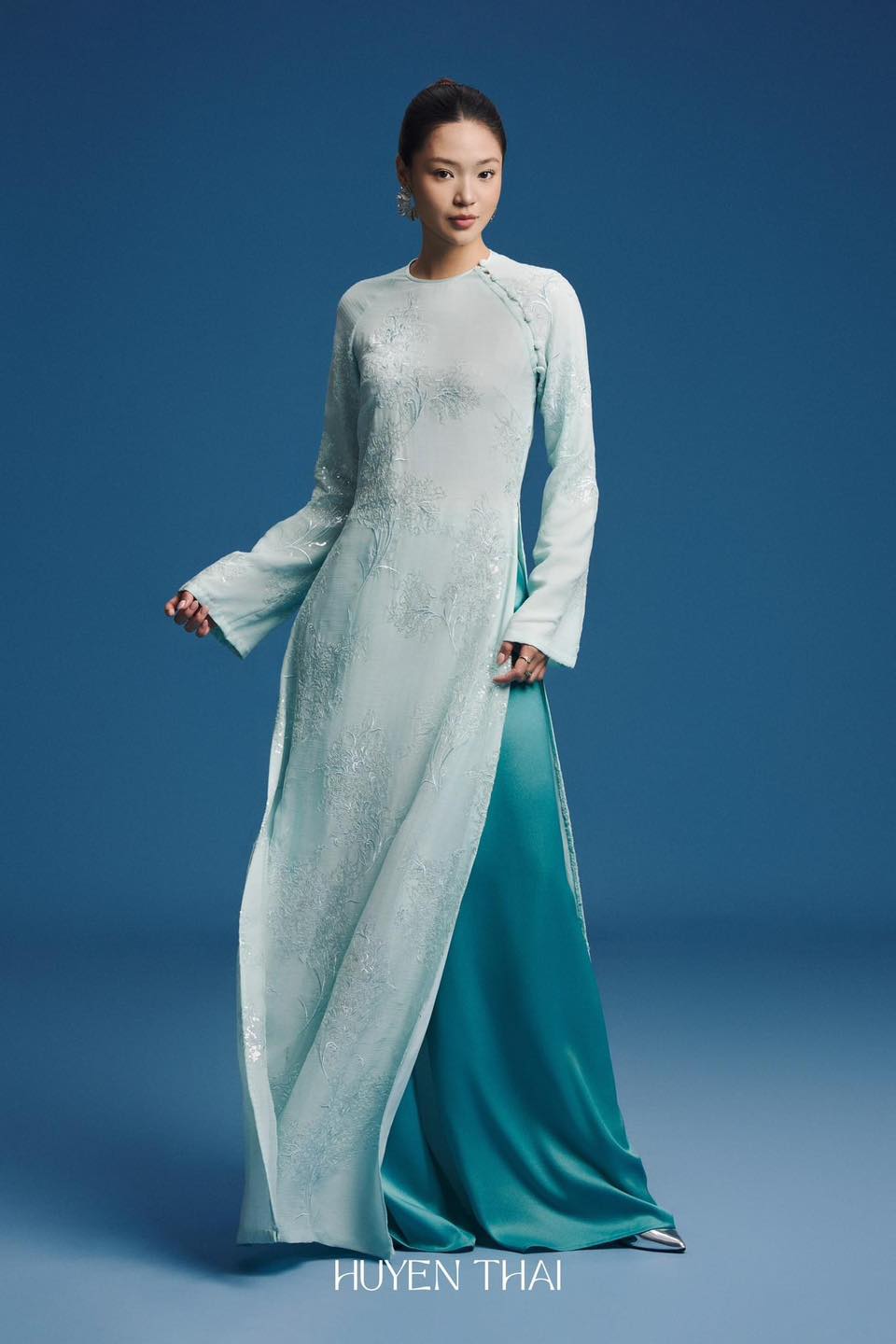 Vietnamese Ao Dai - Uyen My - Modern Ao Dai Set - front view in silk in light blue by Huyen Collection