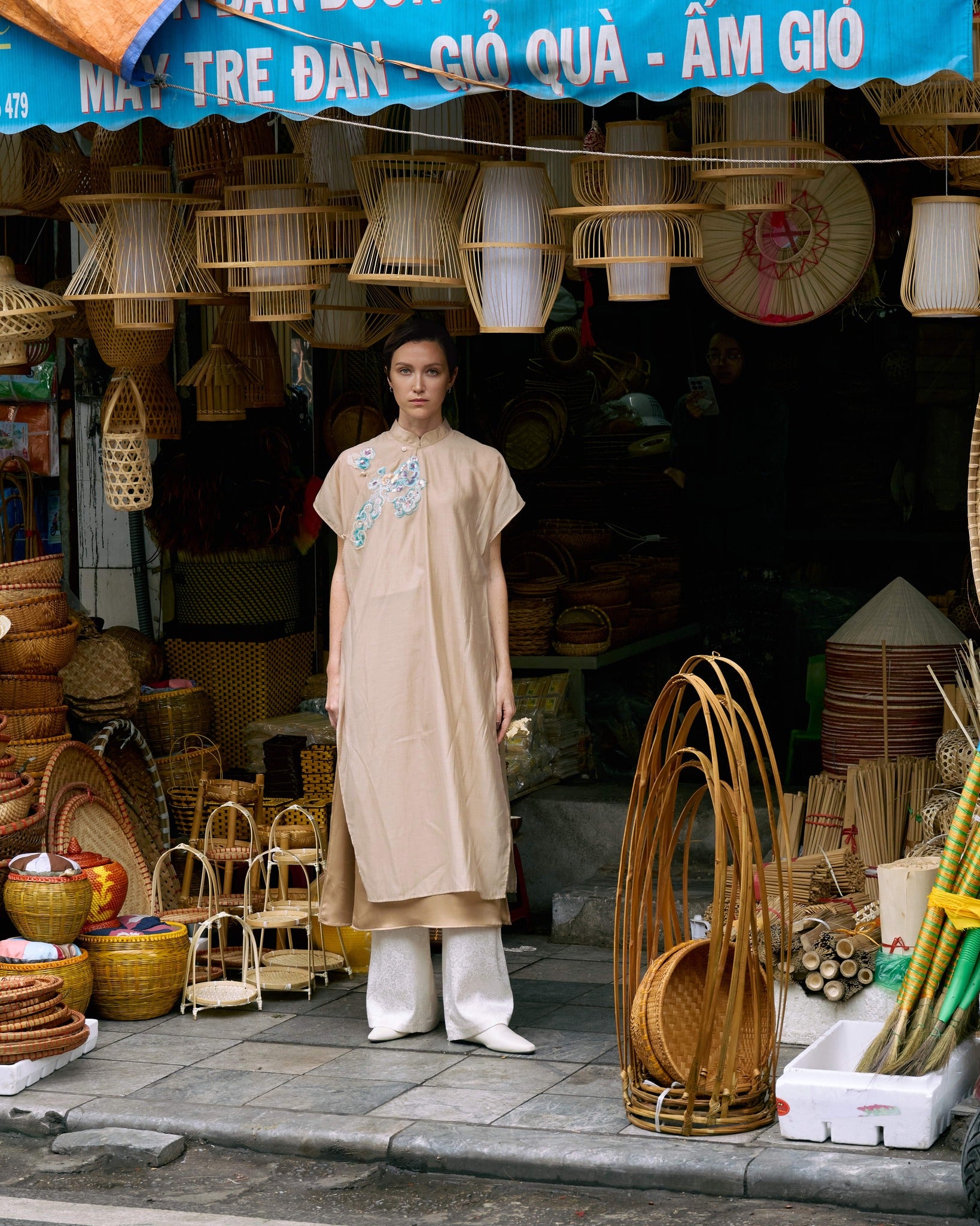"Van Sa Set - Beige Ao dai tunic in silk with modern traditional design, Vietnamese cultural attire."