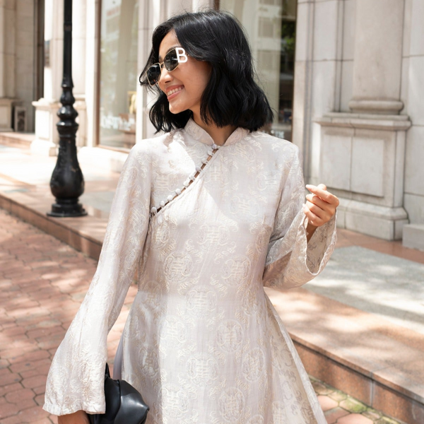 Vietnamese Ao Dai - “Bạch Ngọc” - Wormsilk Ao Dai Set in Ivory Grey - front view in beige by Huyen Collection