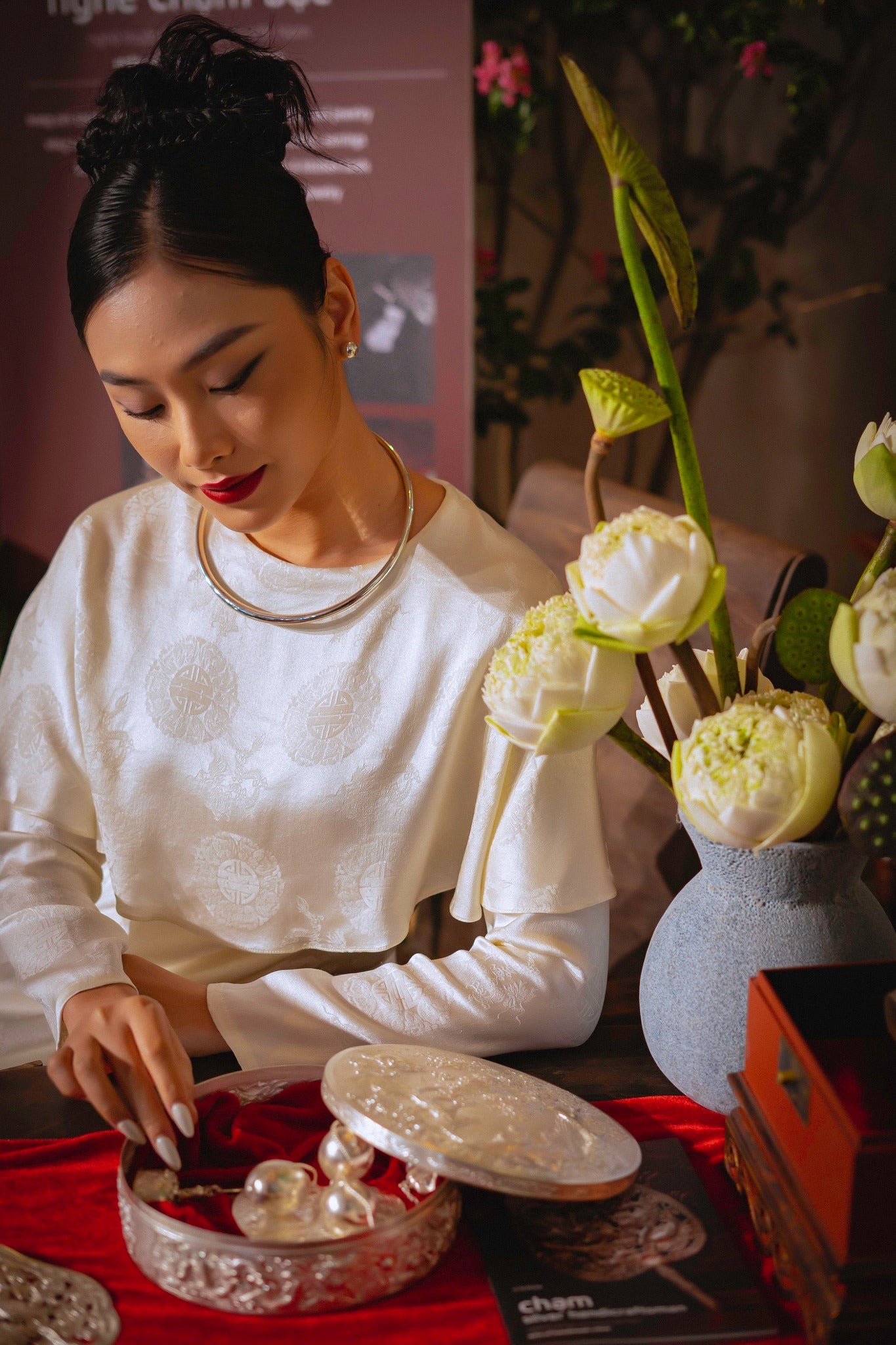 "Vang Long Minh Torque Necklace in Fine-silver with Dragon pattern, artisan-crafted, modern design, red and silver colors, by HI de Maison, emphasizing cultural heritage."