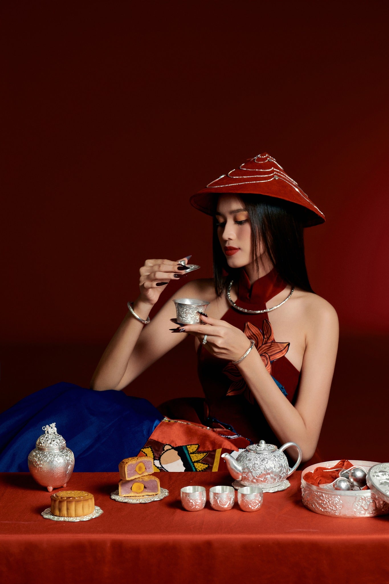 "Linh Văn Hollow Bangle in Lotus or Dragon Pattern, artisan silver and red, cultural authenticity by HI de Maison."