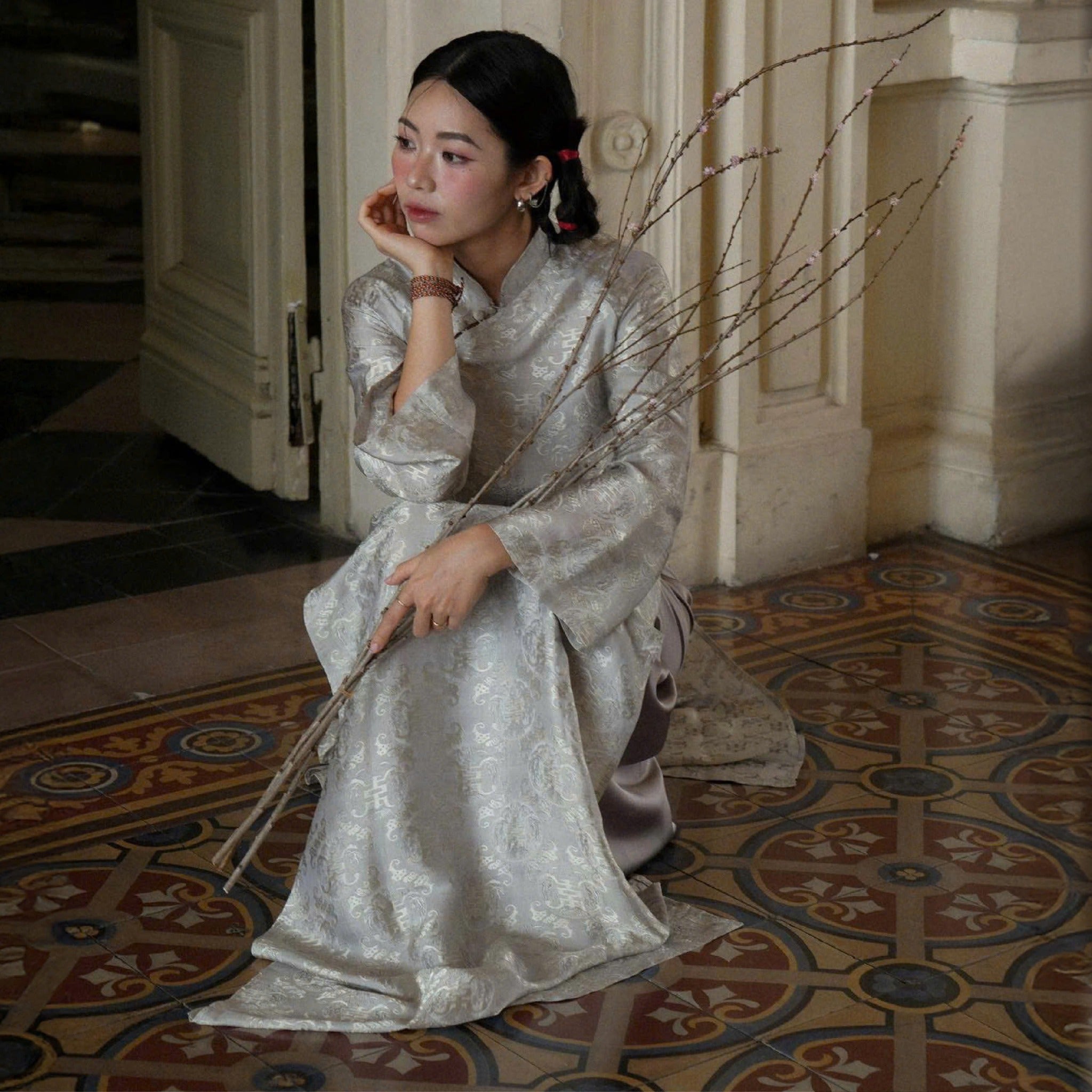 "Bạch Ngọc Wormsilk Ao Dai Set in ivory grey silk jacquard, traditional Vietnamese dress by Huyen Collection."