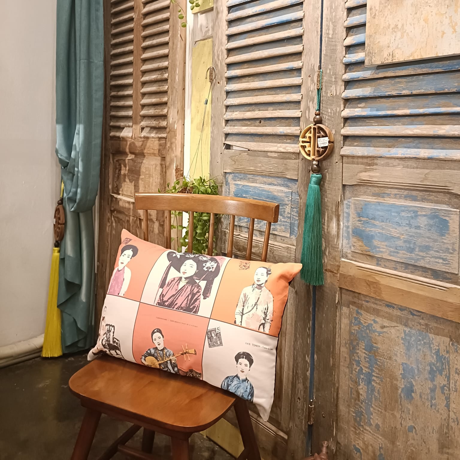 "Faces of Vietnam cushion cover in salmon tone, cotton-linen blend, featuring traditional ethnic Vietnamese portraits."