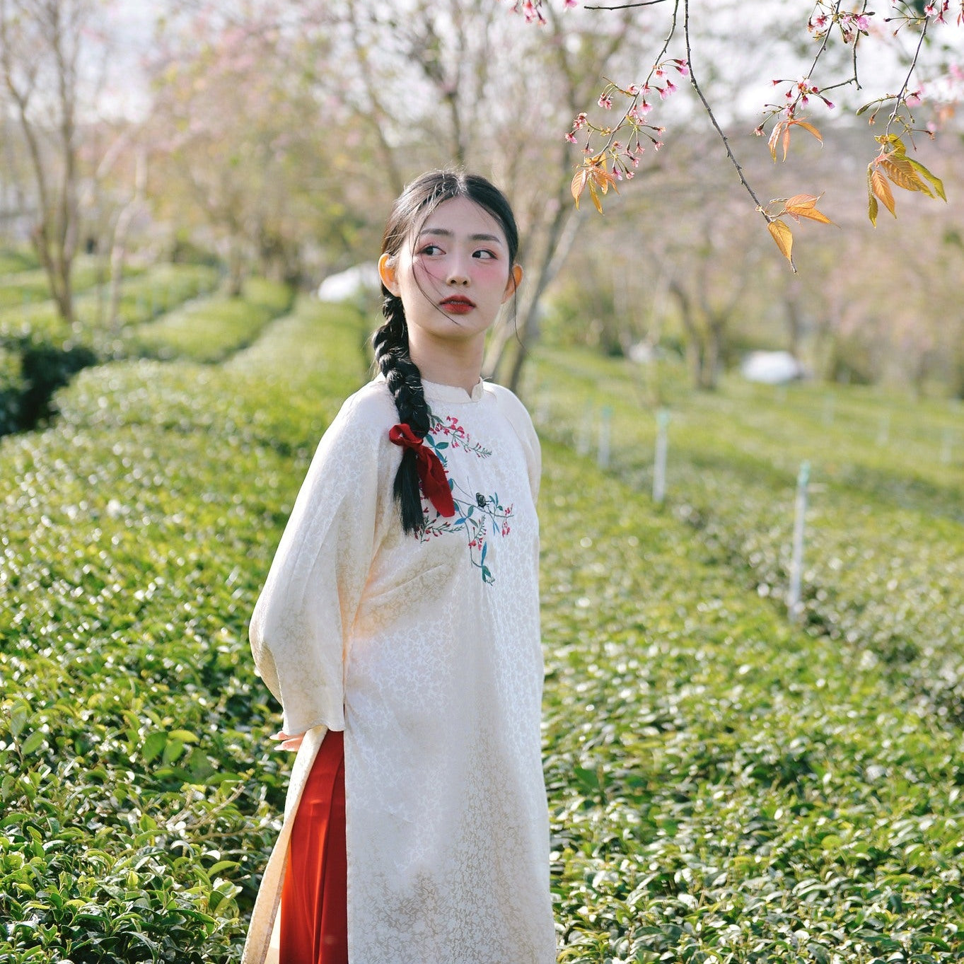 Vietnamese Embroidery - Ho Diep – Embroidered Áo Dài Set in Cream [Modern cut] - side profile in silk in white by Moc