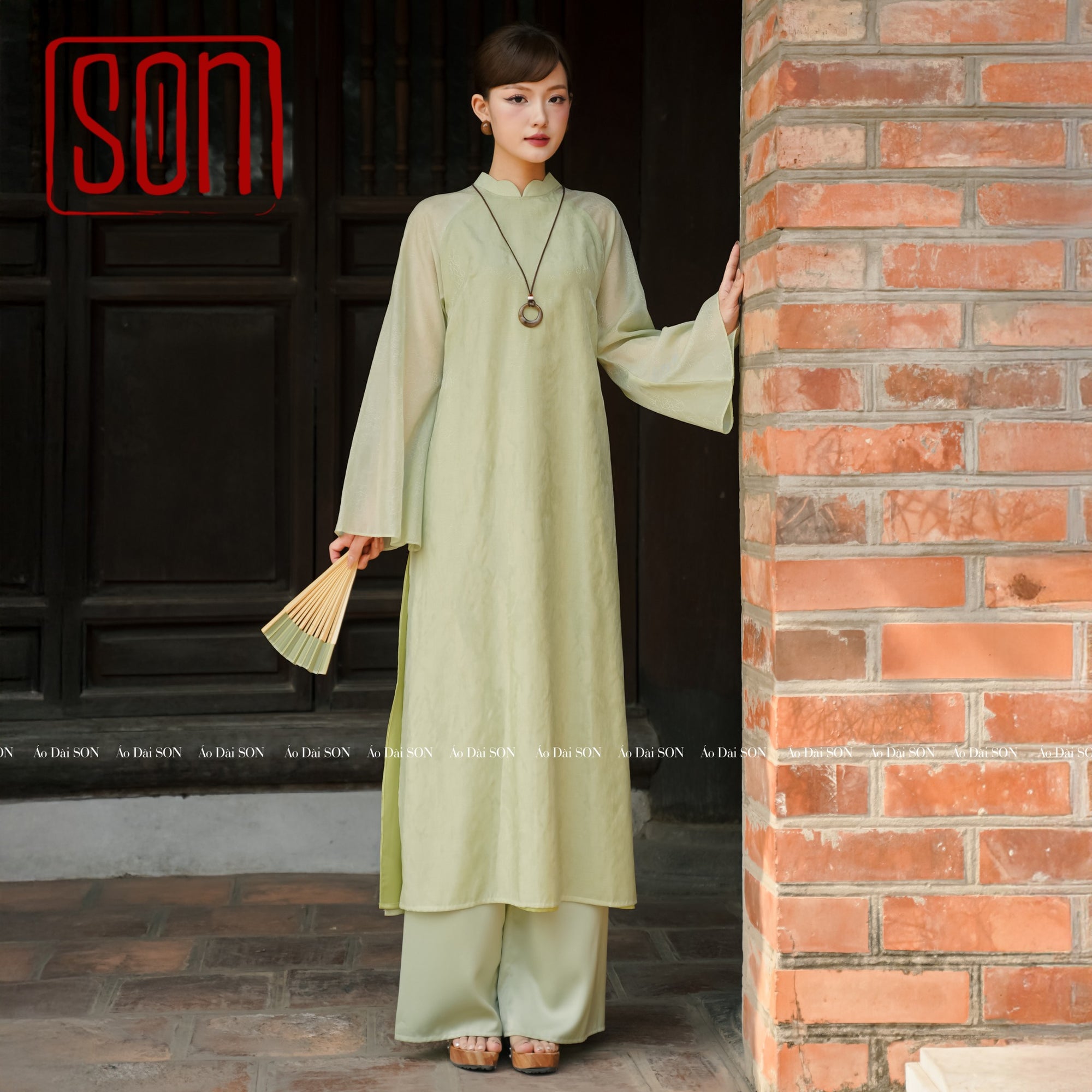 "Thy Son Ao Dai set in light green silk with floral jacquard, traditional Vietnamese dress by SON."