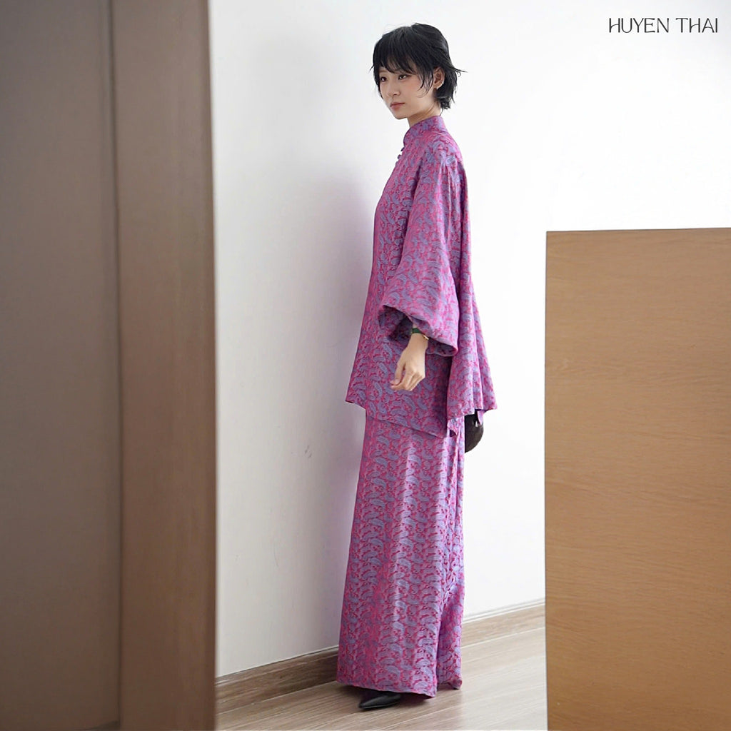 "KY Ao-Ngan Ao dai in violet pink wormsilk, modern jacquard pattern, Vietnamese artisan design"