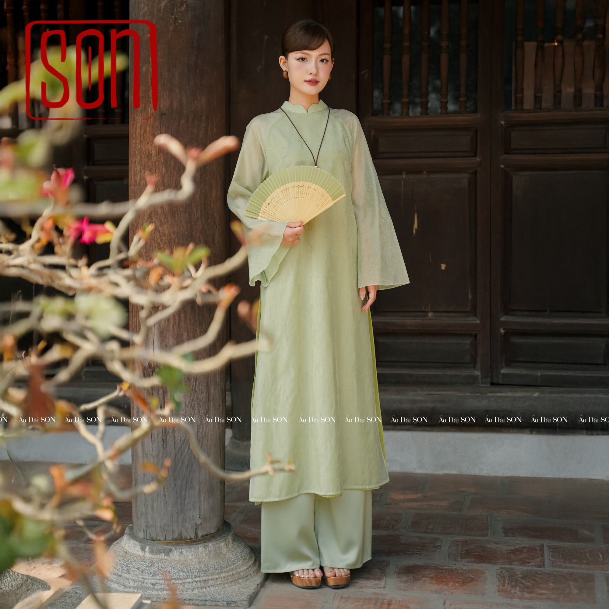 "Thy Son Ao Dai set in light green silk with floral jacquard, traditional Vietnamese dress by SON."