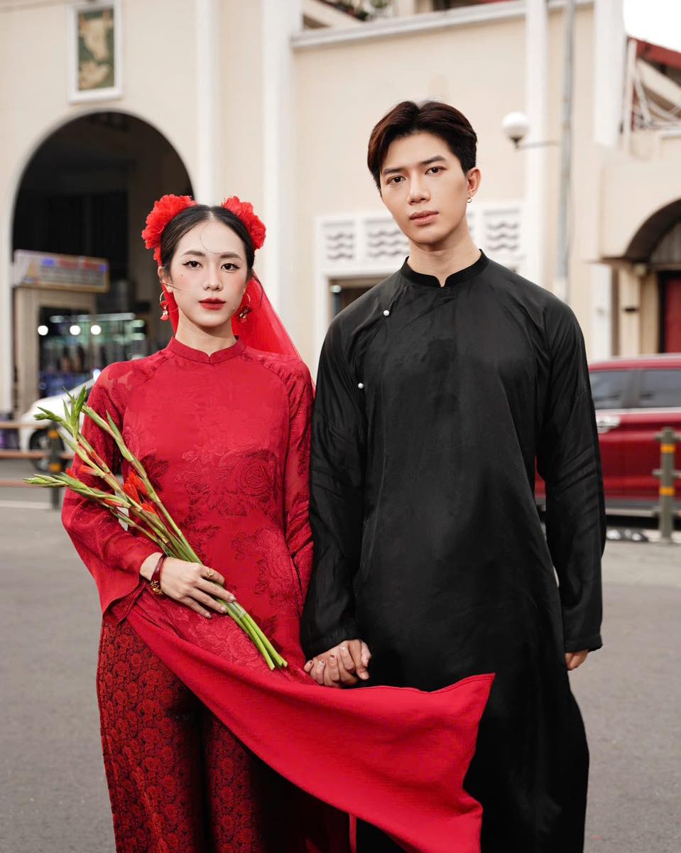 "Traditional Vietnamese Ao Dai for Men in black silk, cultural heritage attire"