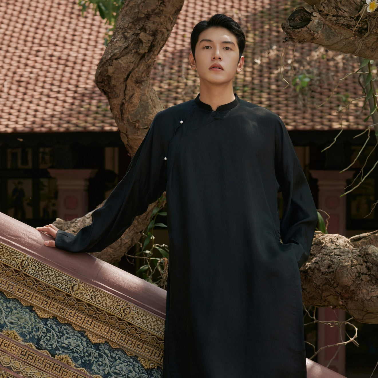 "Traditional Vietnamese Ao Dai for Men in black artisan silk, modern design by Moc"