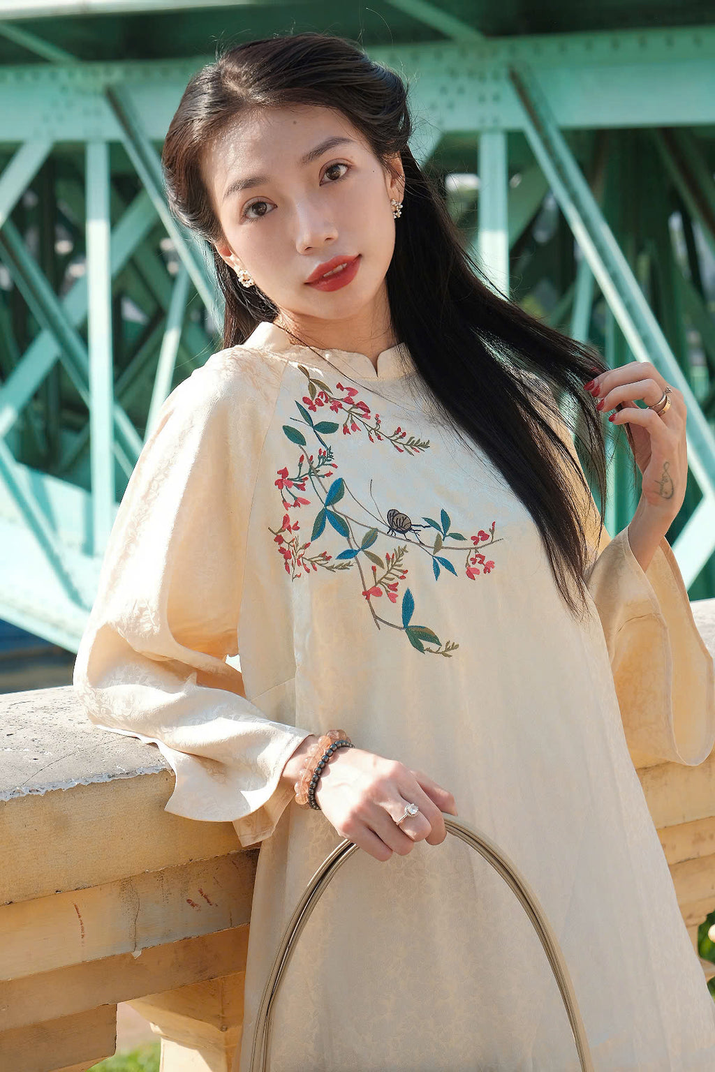 Authentic Vietnamese Ao Dai "Ho Diep" in cream jacquard silk with hand-embroidered floral motifs