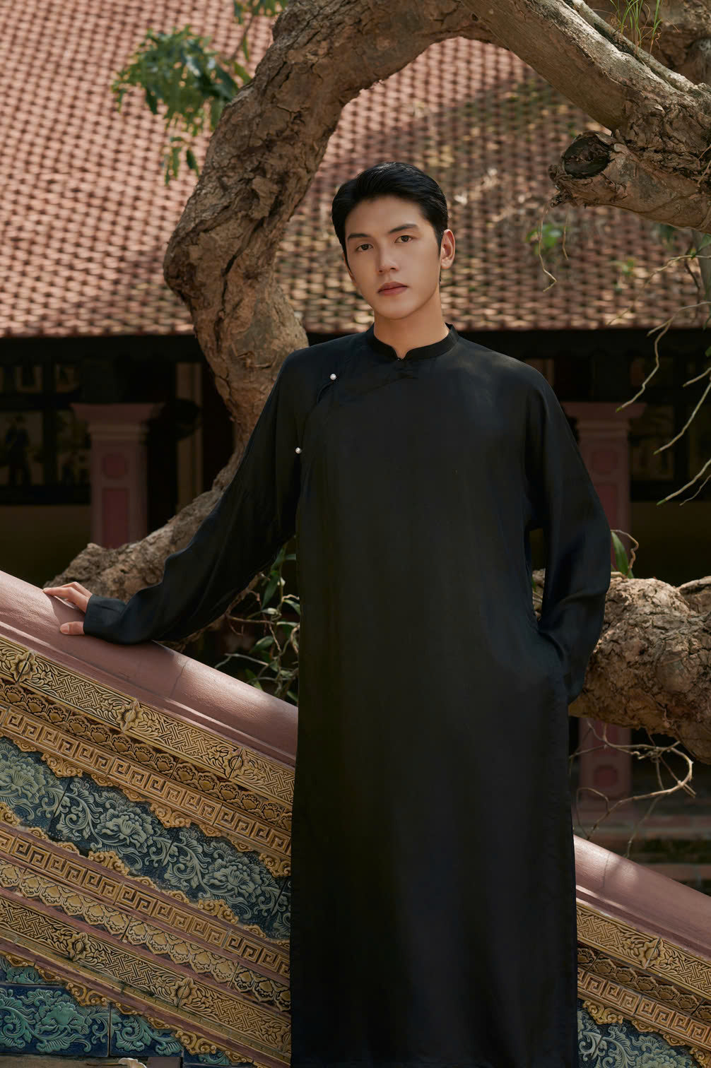 "Traditional Vietnamese Ao Dai for Men in black silk, modern design by Moc"