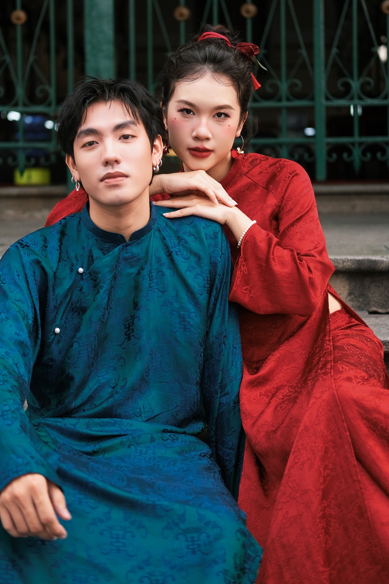 "Loc Tho Ao Dai for Men in dark teal wormsilk, traditional Vietnamese dress with floral jacquard pattern."