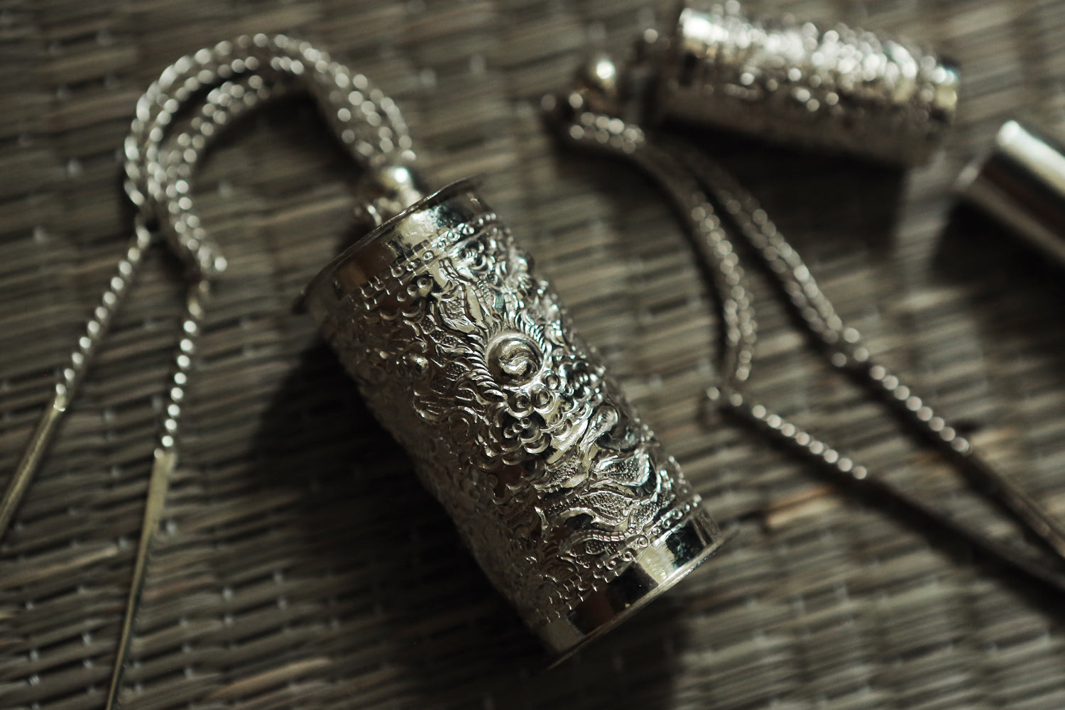 Vietnamese Embroidery - Khánh Âm – Sacred Scroll Pendant - detail close-up in metallic in silver by HI de Maison