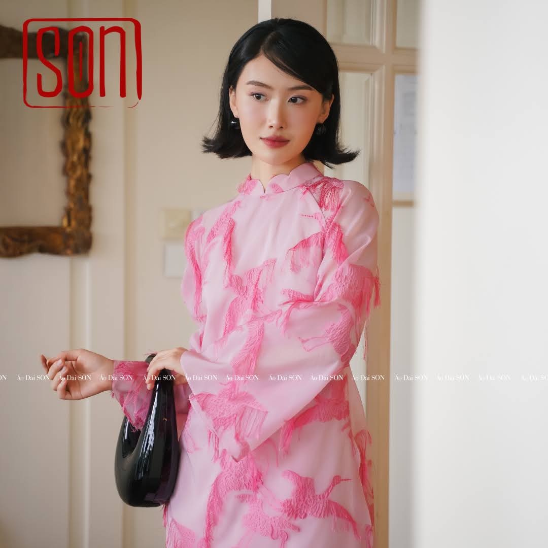 "Hac Son" pink embroidered organza Ao Dai set, traditional Vietnamese wedding dress.