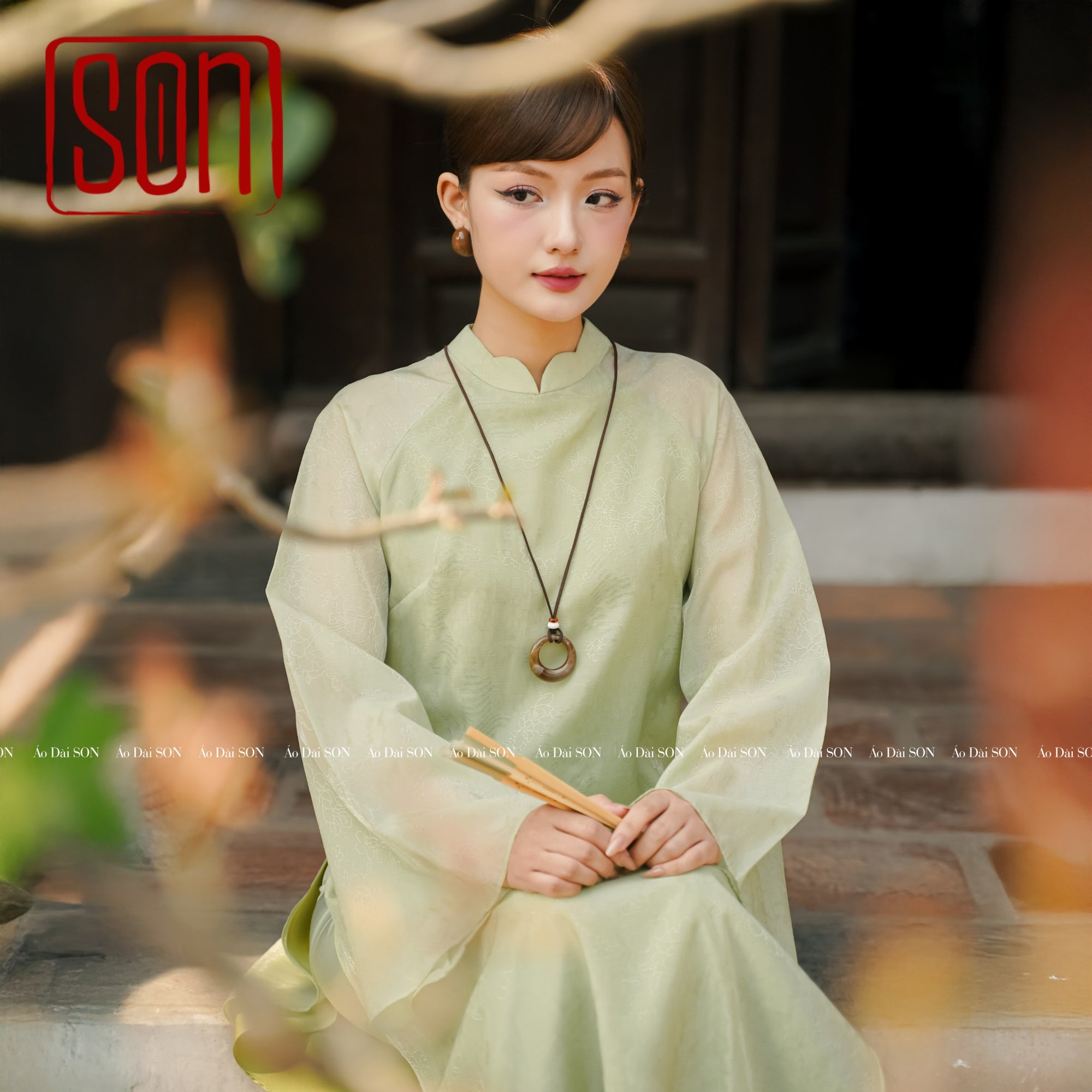 "Thy Son Ao Dai set in light green silk with floral jacquard, traditional Vietnamese dress by SON"