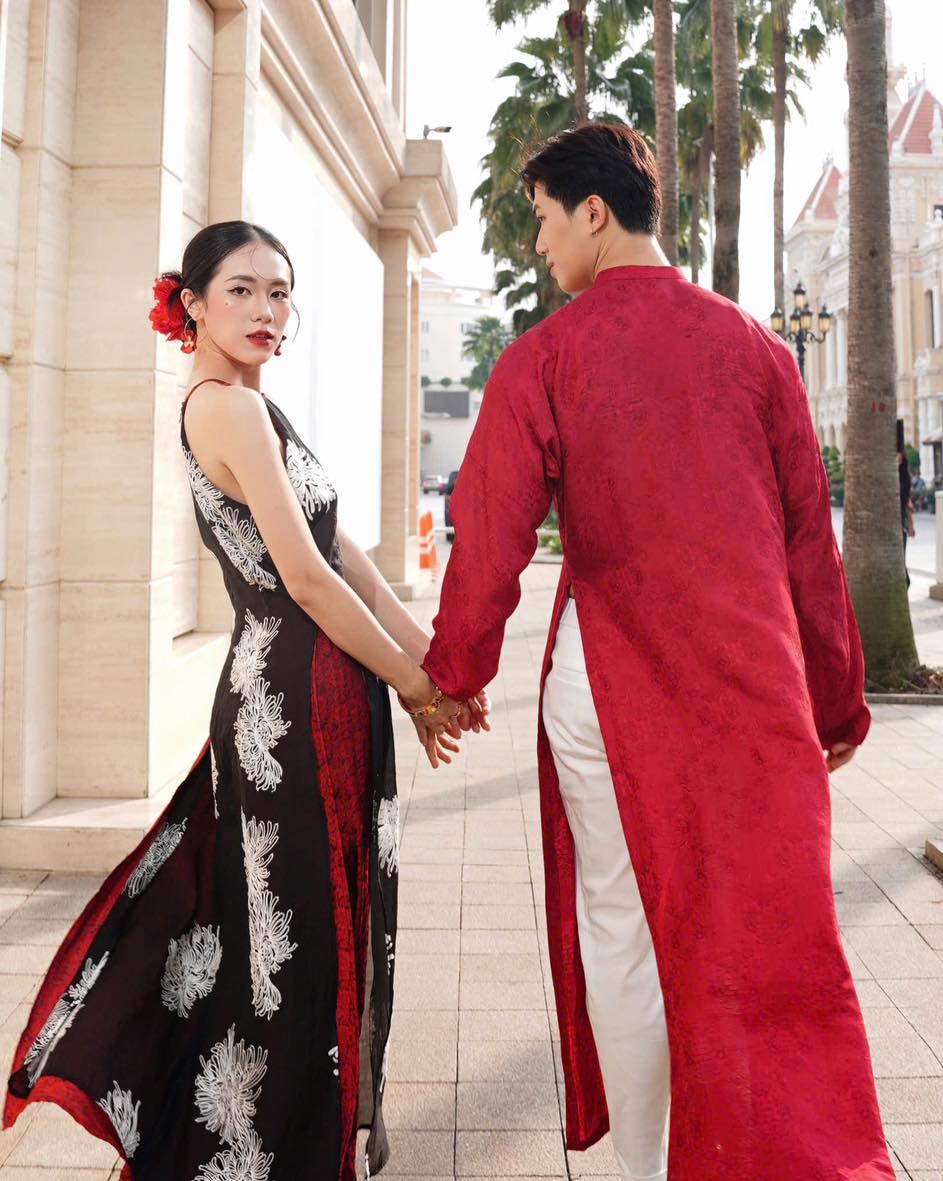 "Loc Tho Ao Dai for Men in crimson wormsilk, traditional Vietnamese dress with floral jacquard pattern."