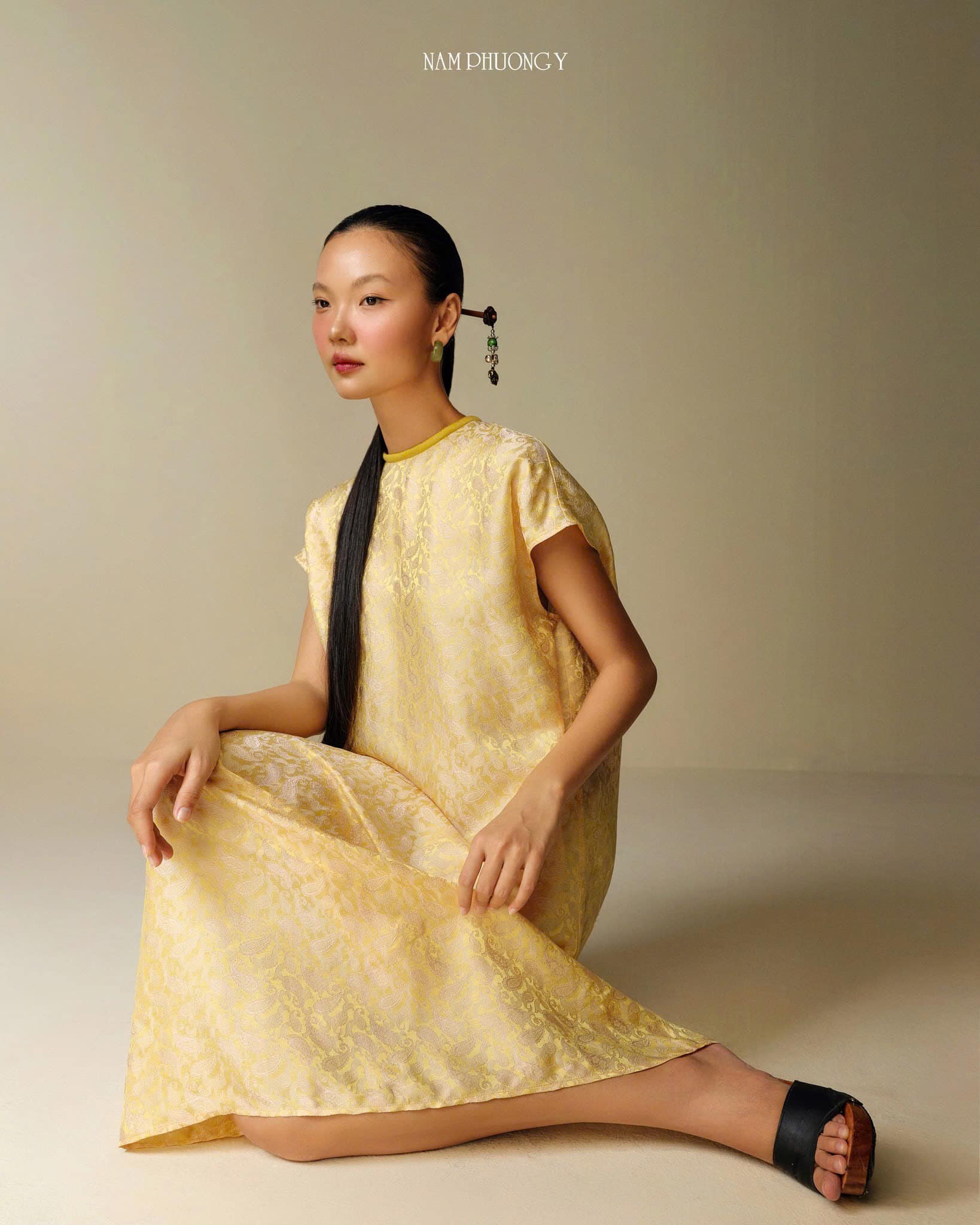 "Hoang Cuc Premium Worksilk Dress in Blooming Yellow, traditional Vietnamese silk jacquard with floral pattern."