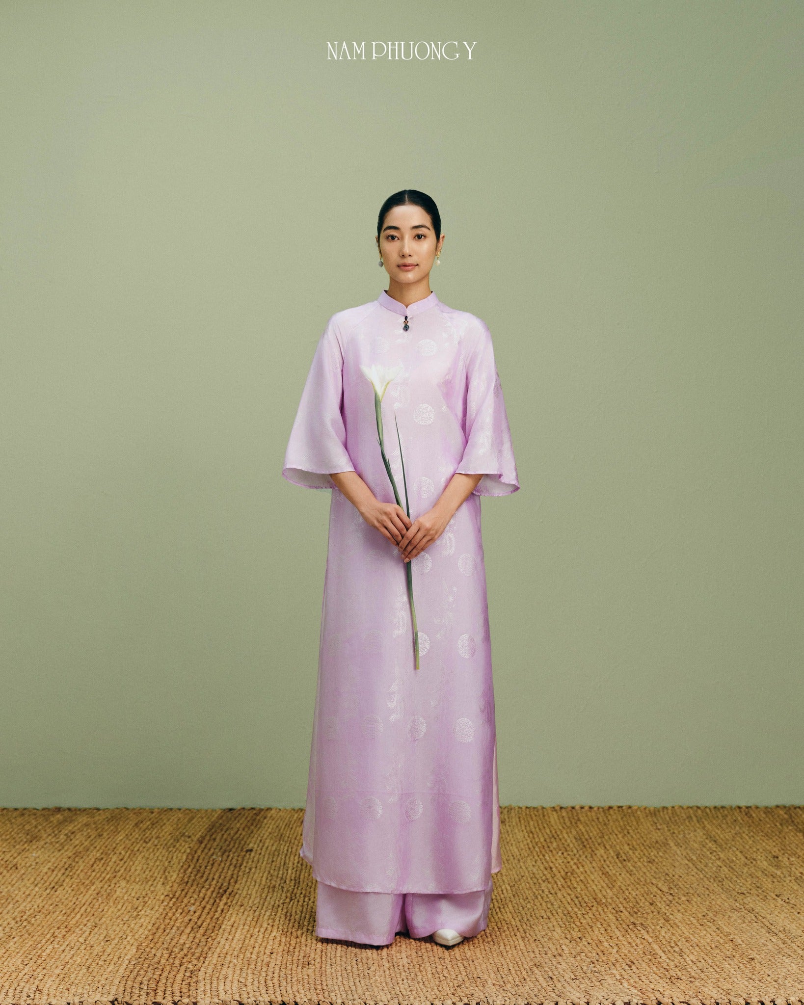 "Phung Cac luxury Ao dai set in light pink silk jacquard, traditional Vietnamese dress by Nam Phuong Y."