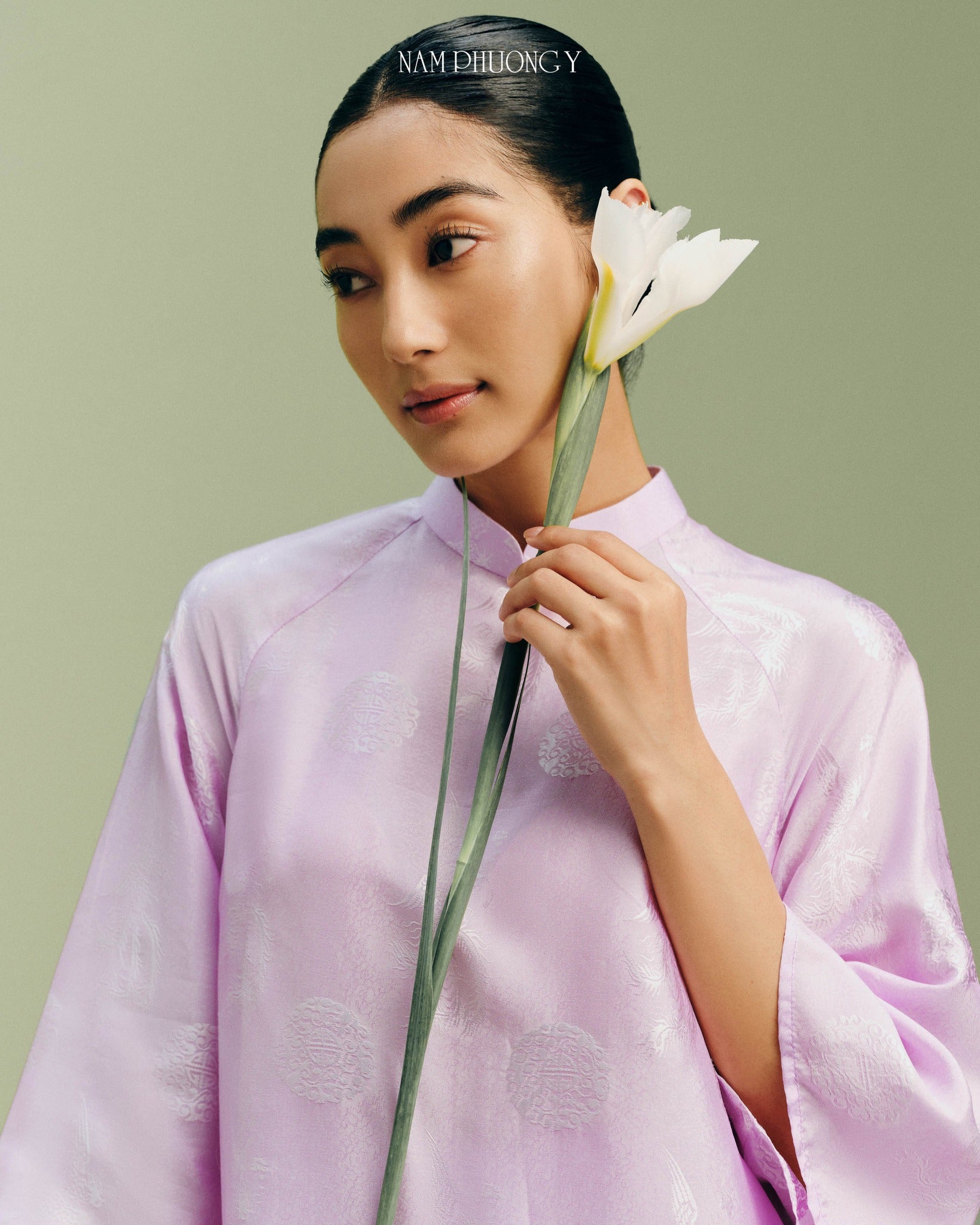 "Phung Cac Luxury Ao dai in light pink silk jacquard, traditional Vietnamese dress by Nam Phuong Y"