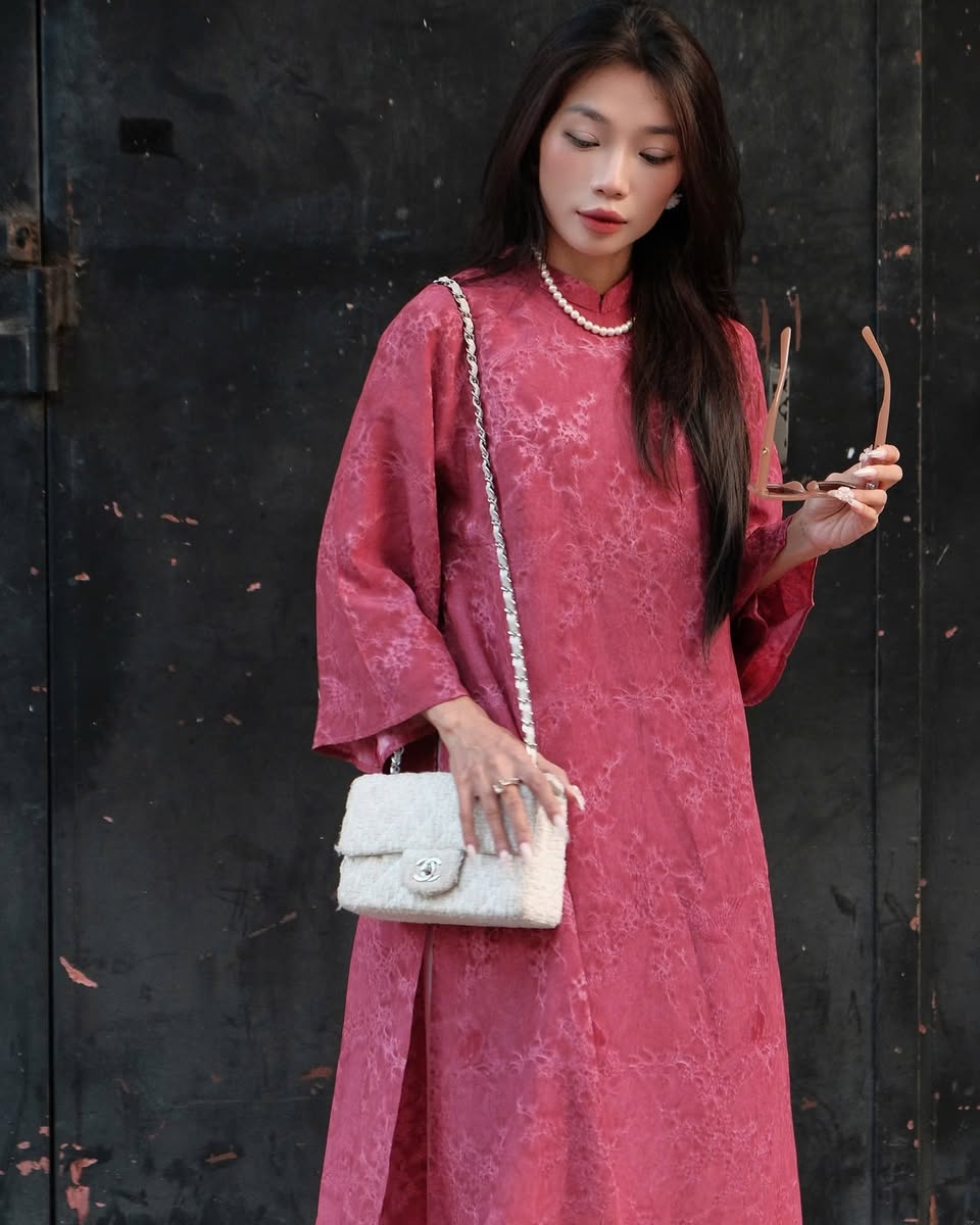 "Khong Tuoc Ao Dai set in dark pink viscose, traditional Vietnamese dress by Moc, featuring artisan silk jacquard."