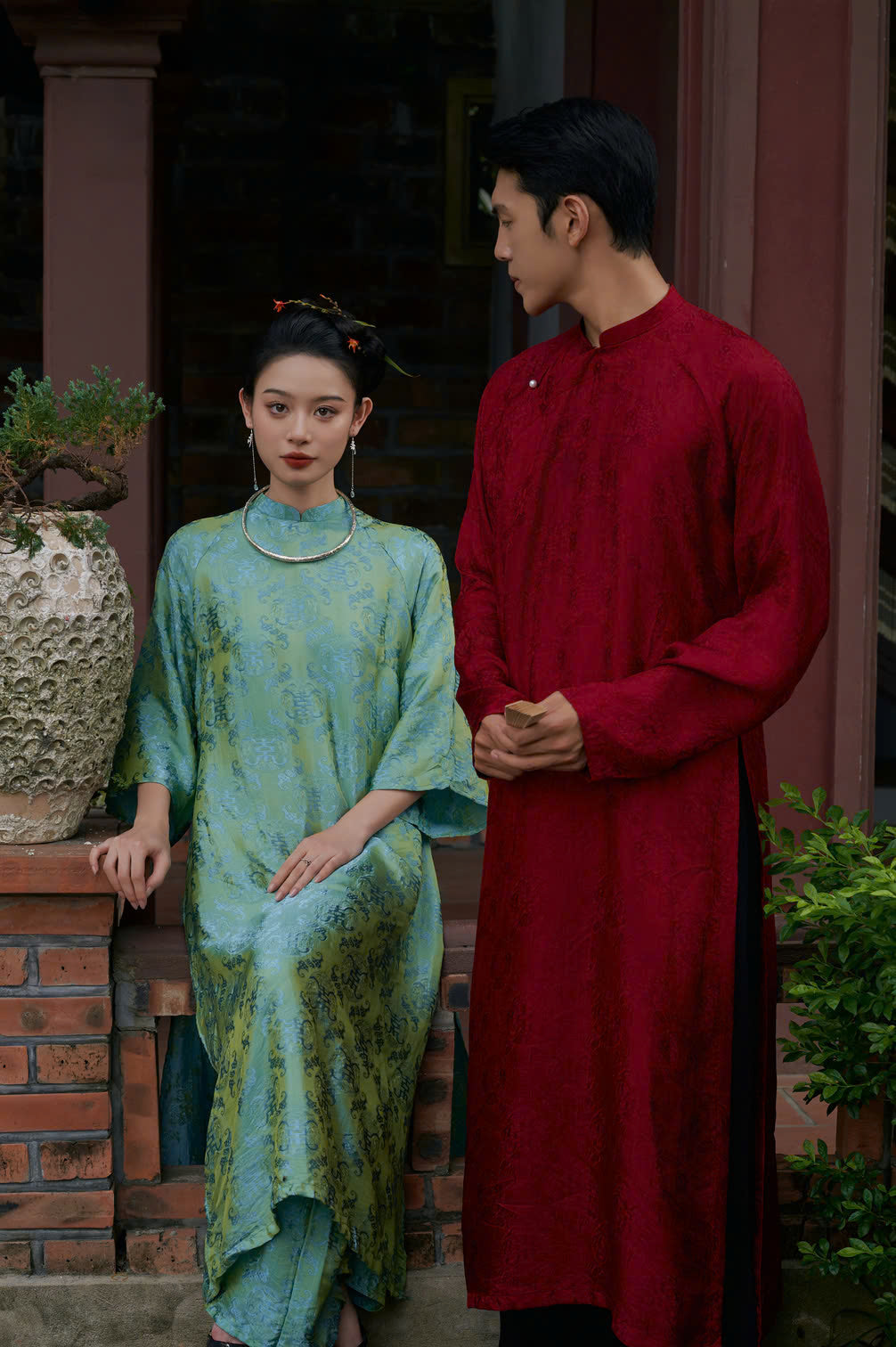 "Loc Tho Ao Dai for Men in crimson wormsilk, traditional Vietnamese dress with floral jacquard pattern."