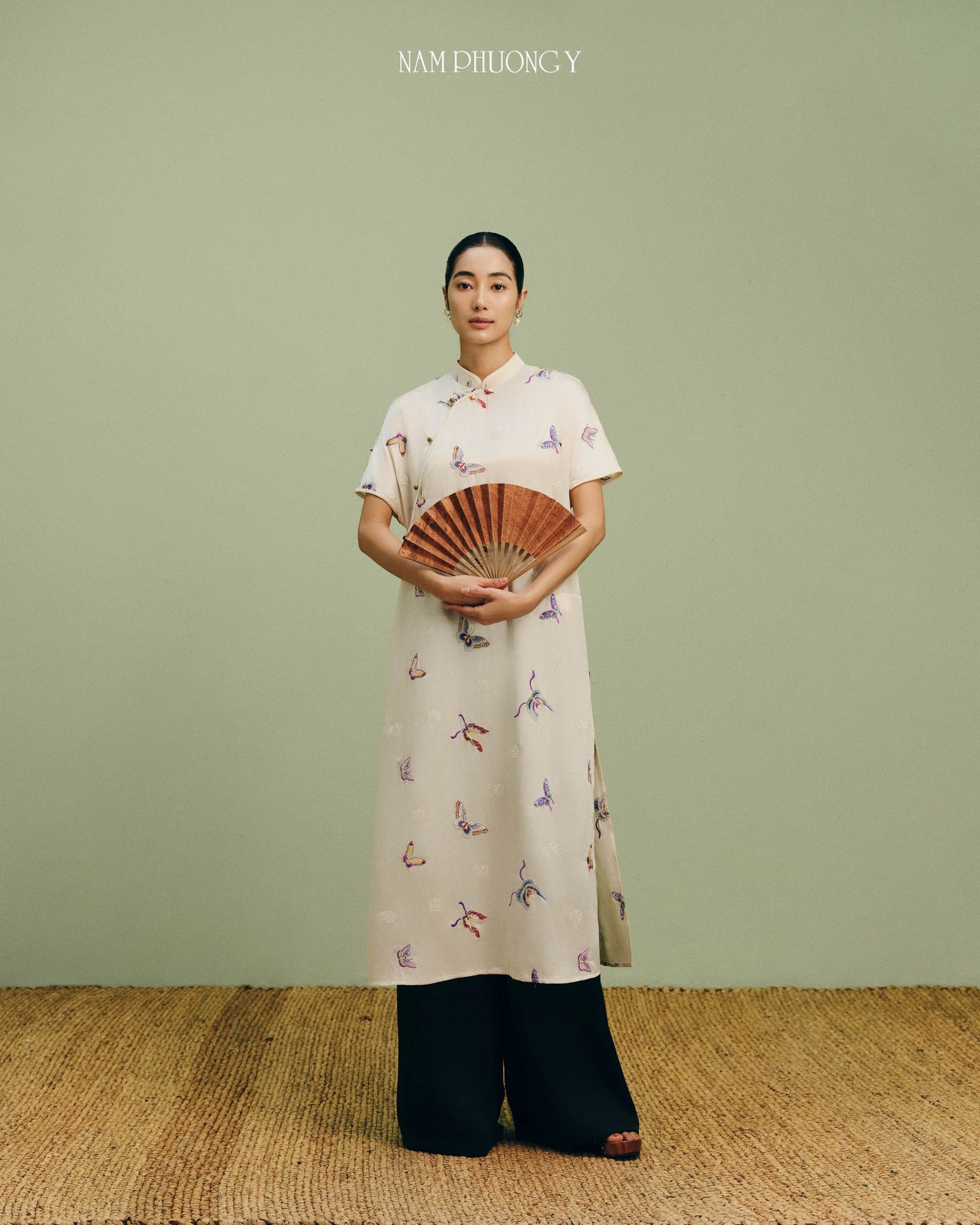 Vietnamese Ao Dai - Tú Điệp - Premium Short-sleeve Embroidered Áo Dài Set in Ivory Silk - front view in cream by Nam Phuong Y
