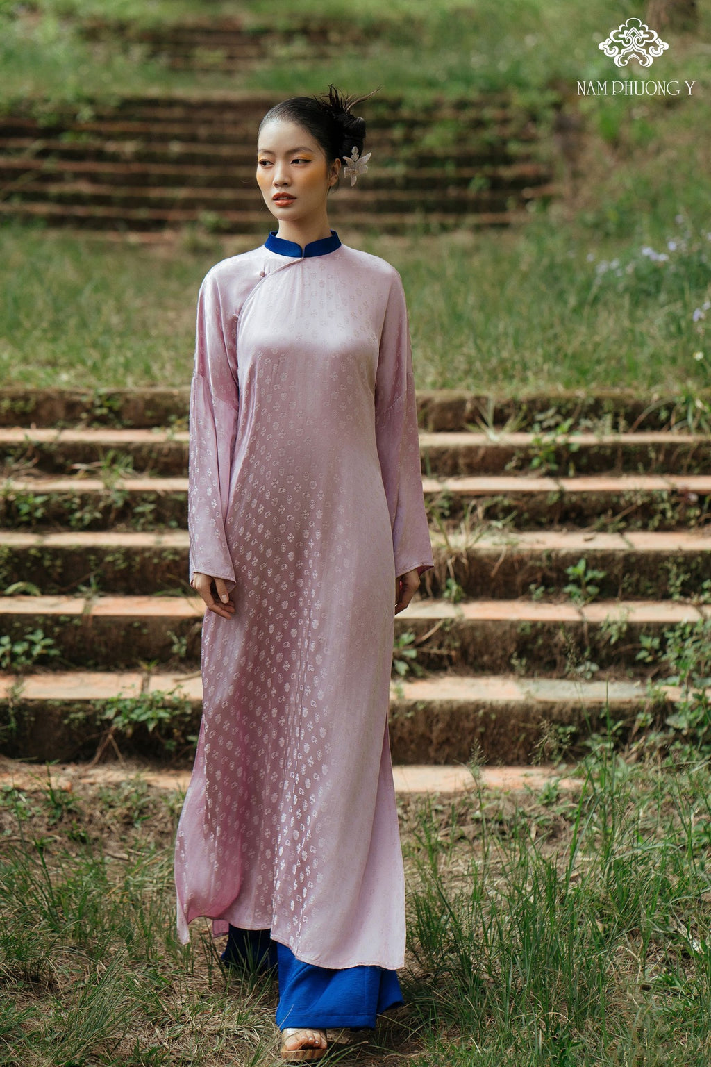 "Y Phuong Luxury Ao dai in light pink silk with floral jacquard, traditional Vietnamese dress"