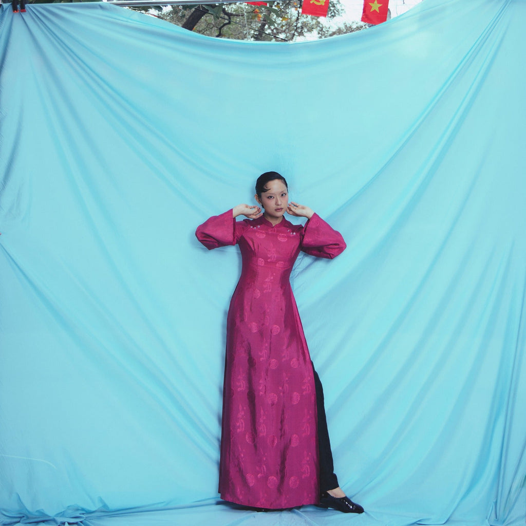 "Phuong Cac" Royal Jacquard Silk Ao Dai in deep dark magenta, traditional Vietnamese dress.