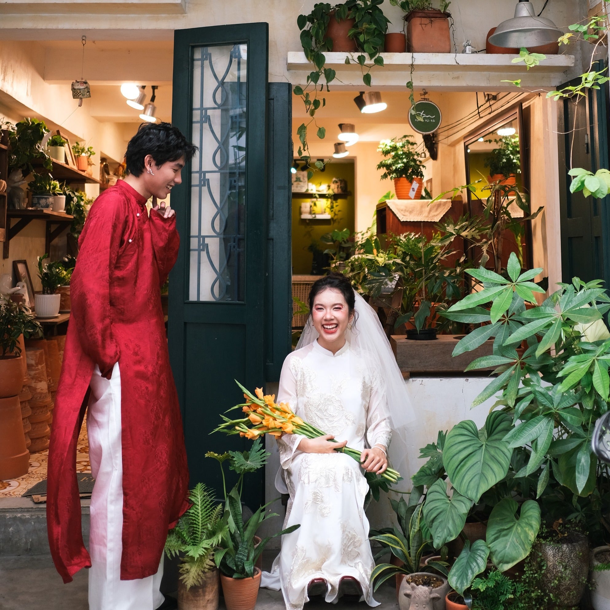 "Loc Tho Ao Dai for Men in crimson wormsilk, traditional Vietnamese dress with floral jacquard pattern."