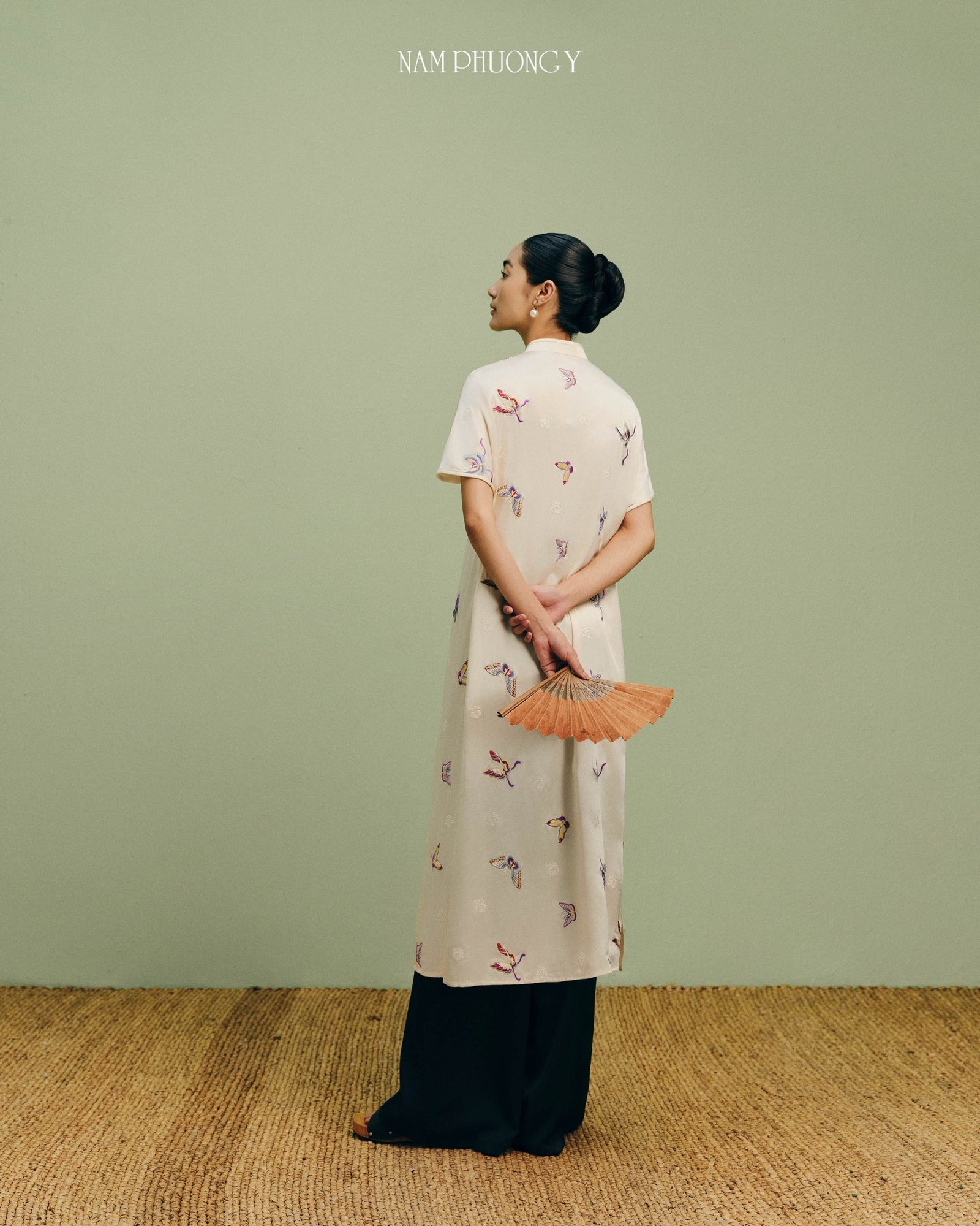 Tú Điệp - Premium Short-sleeve Embroidered Áo Dài Set in Ivory Silk - back view by Nam Phuong Y