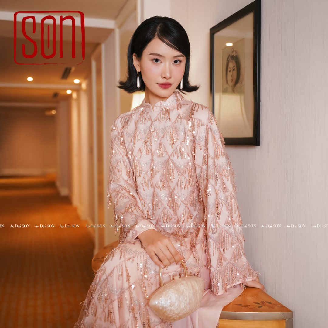 "Thuoc Son sequined Ao Dai set in blush pink silk, traditional Vietnamese dress, wedding collection."