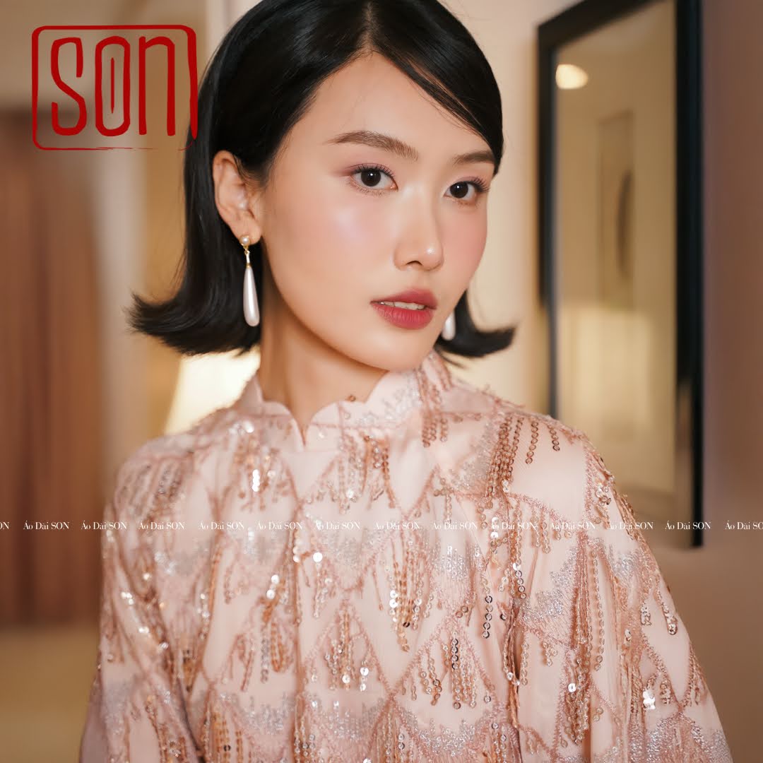 "Thuoc Son sequined Ao Dai set in blush pink silk, traditional Vietnamese dress, wedding collection."