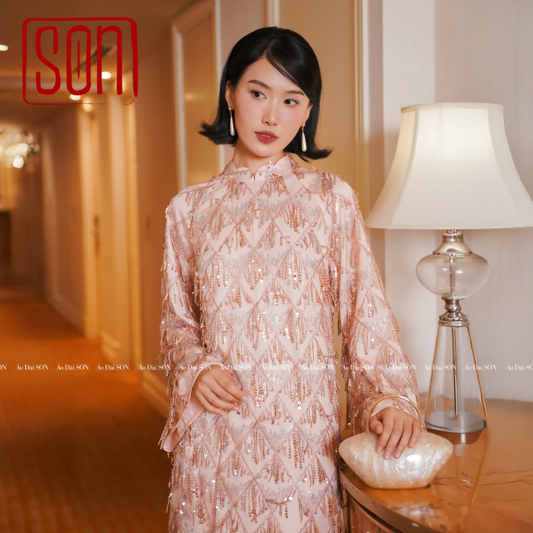"Thuoc Son sequined Ao Dai in blush pink silk, traditional Vietnamese dress, wedding collection"