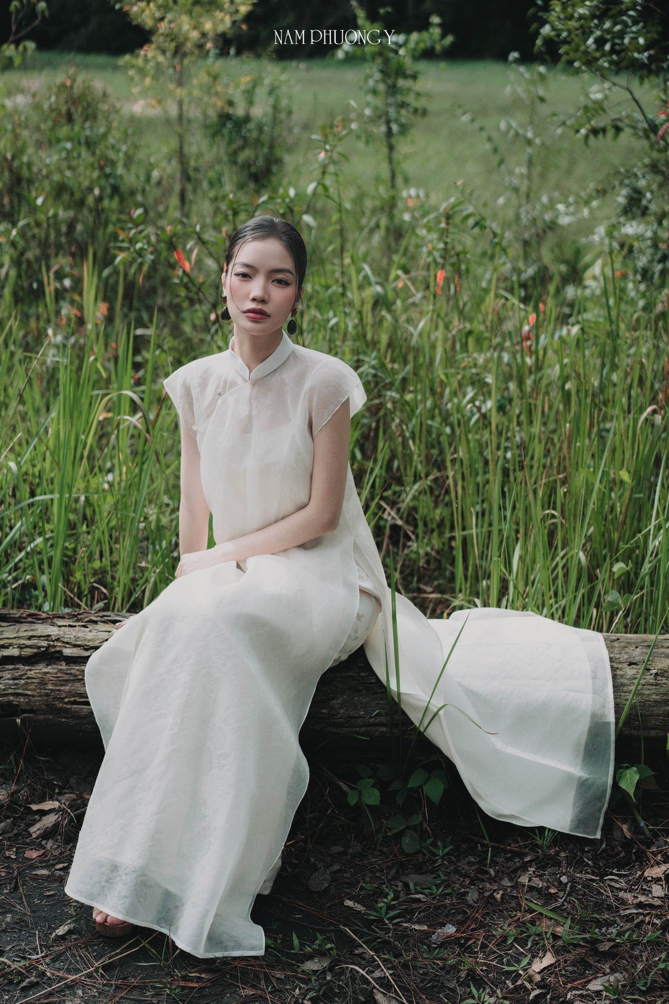 "Nhat Lien Premium Ao dai Set in white silk, traditional Vietnamese dress with modern design by Nam Phuong Y."