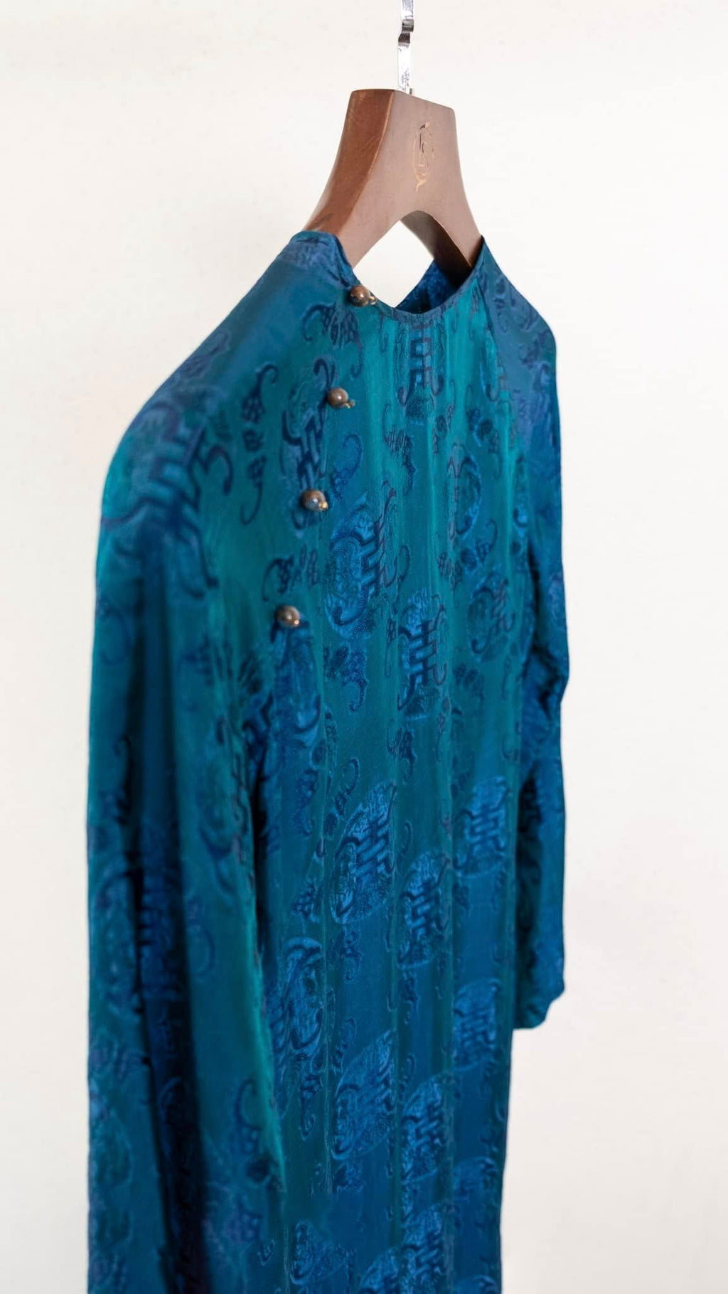 Full length Celestial Indigo áo dài with coordinating chrysanthemum pants from Mộc - complete Vietnamese traditional outfit