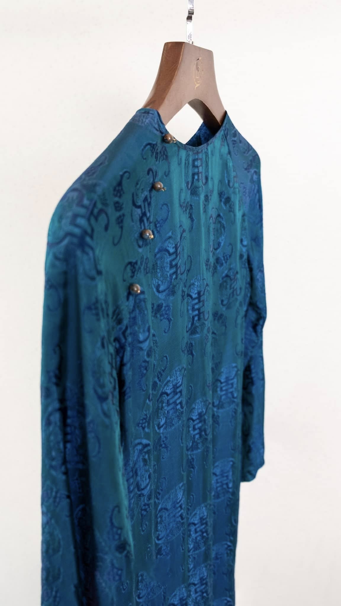 Full length Celestial Indigo áo dài with coordinating chrysanthemum pants from Mộc - complete Vietnamese traditional outfit